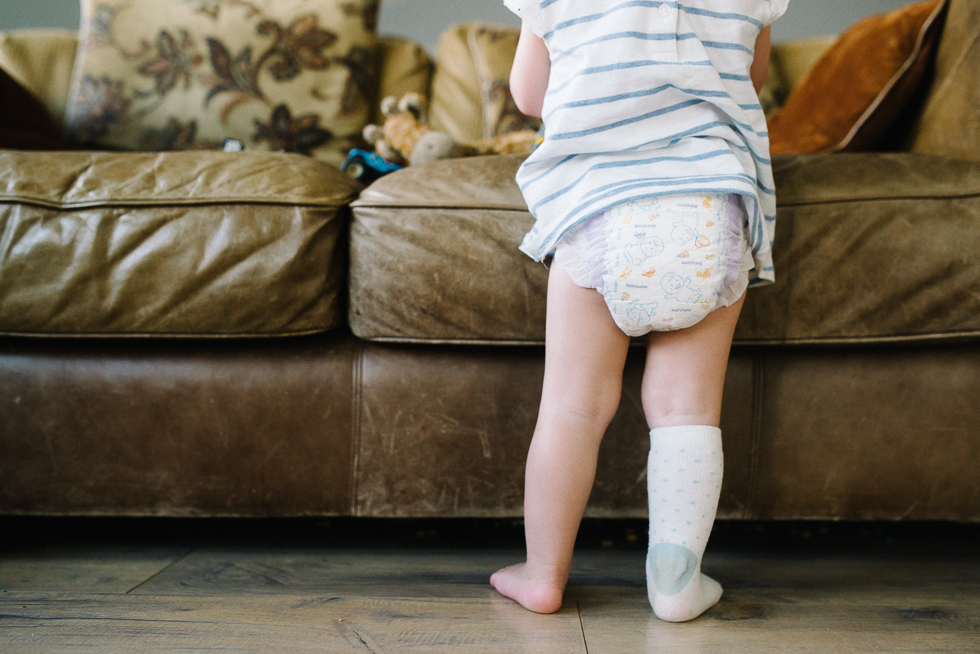 toddler with one sock on - Documentary Family Photography