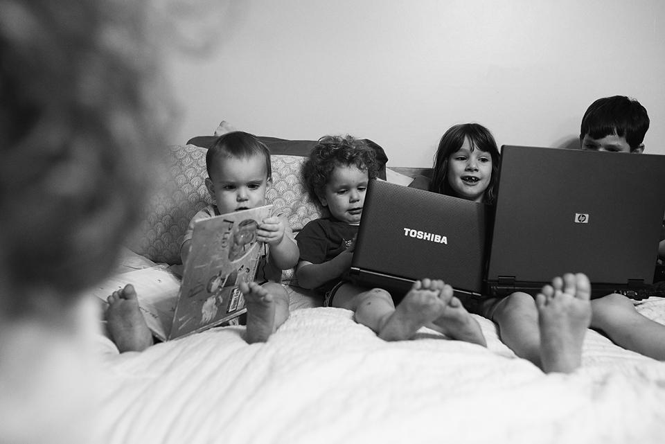 kids on bed with laptops - Documentary Family Photography