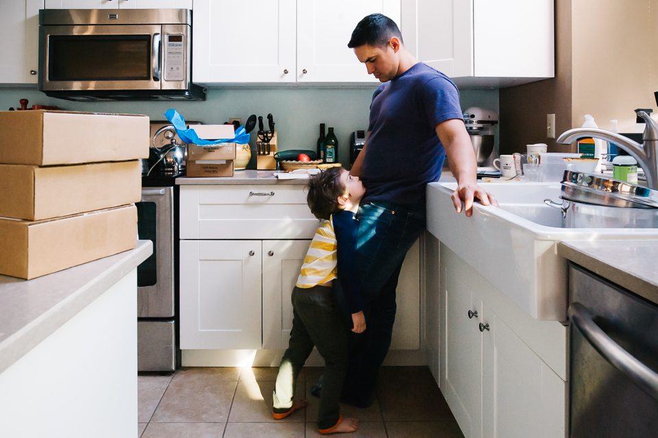 boy pleads with father - Documentary Family Photography