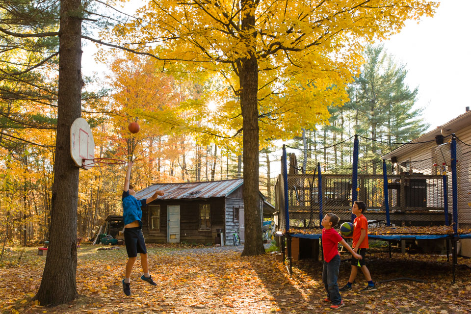 boys play basketball in autumn - Documentary Family Photography