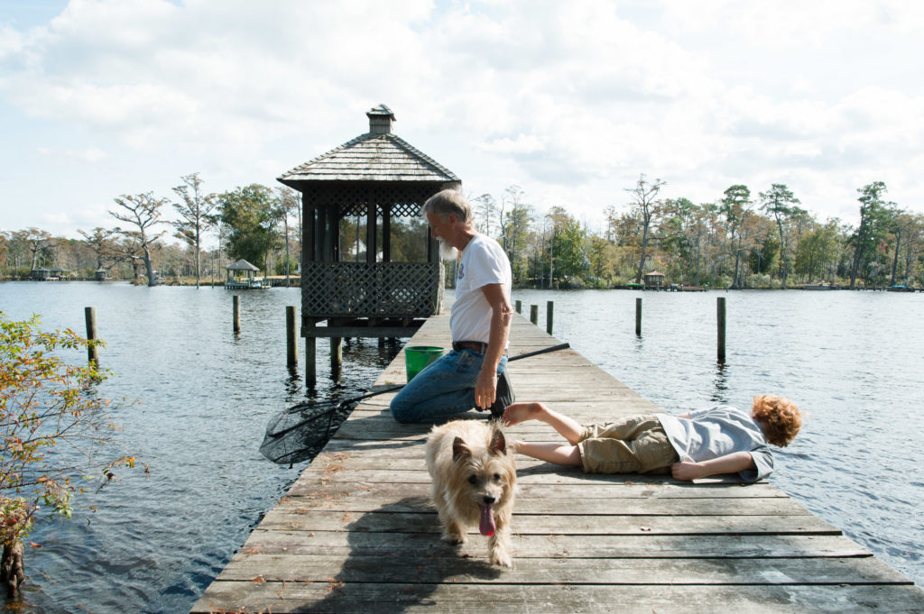 boy and father on dock - Documentary Family Photography