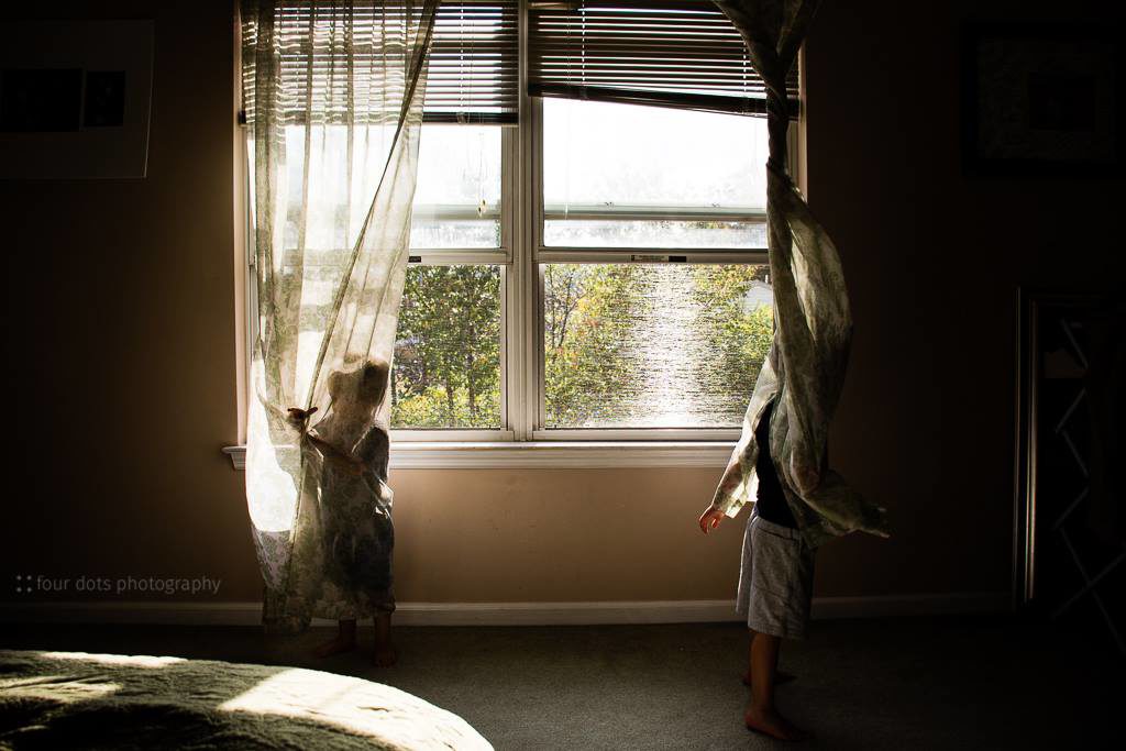 kids play in lace curtains - Documentary Family Photography