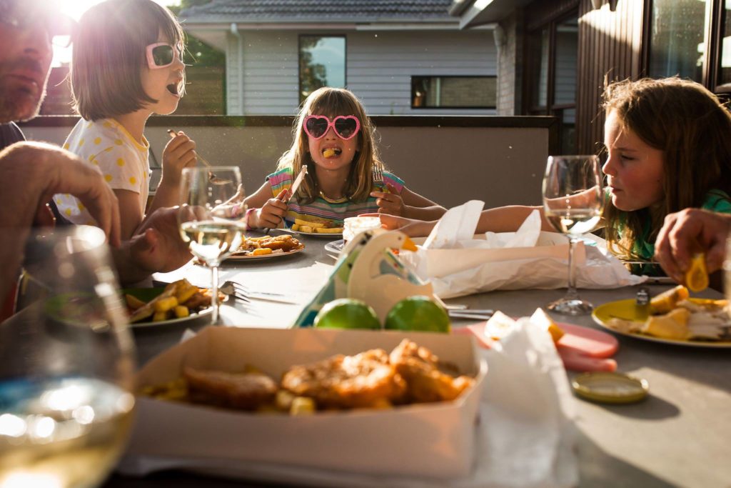 family-eating-outside