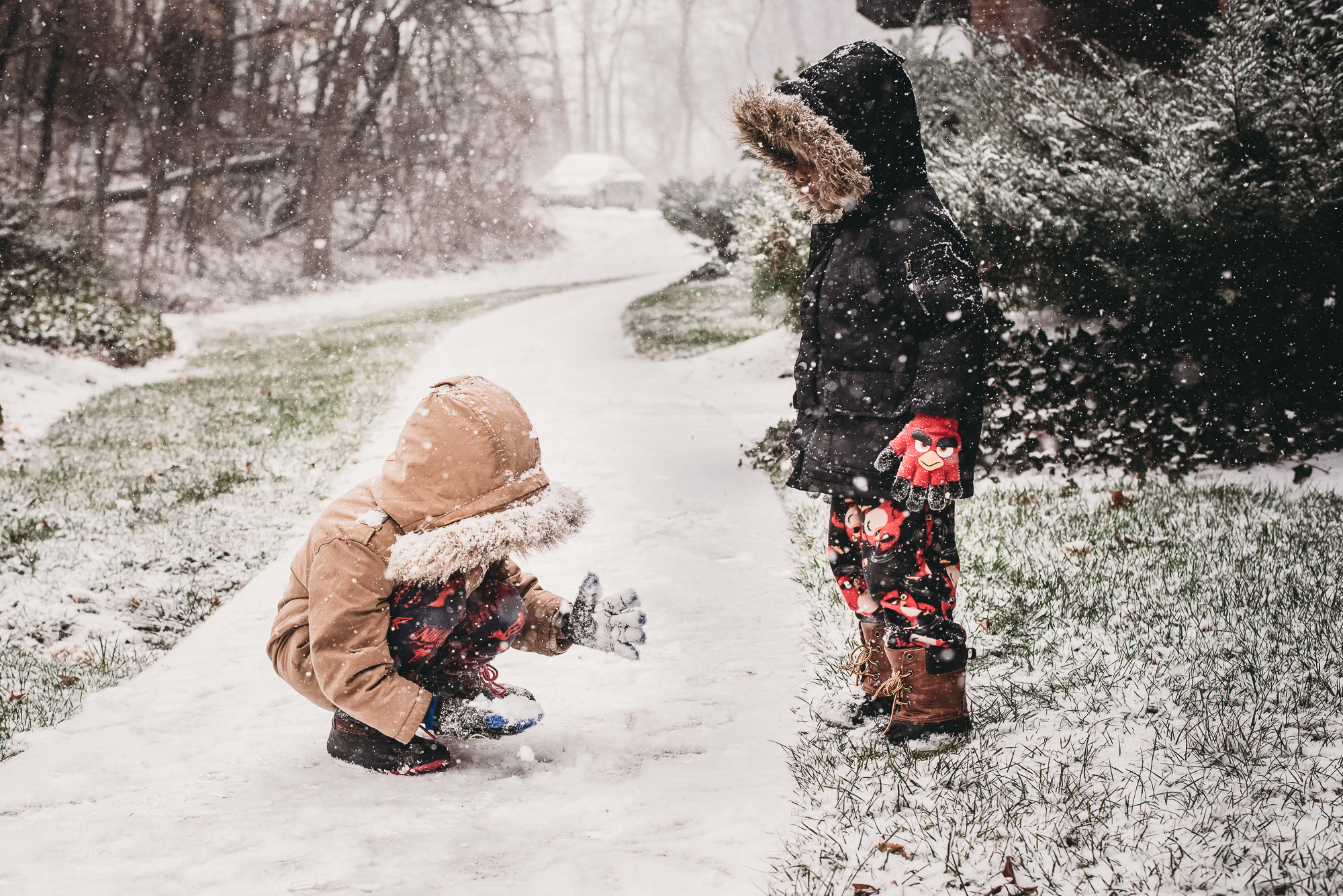 kids play in snow - documentary family photography