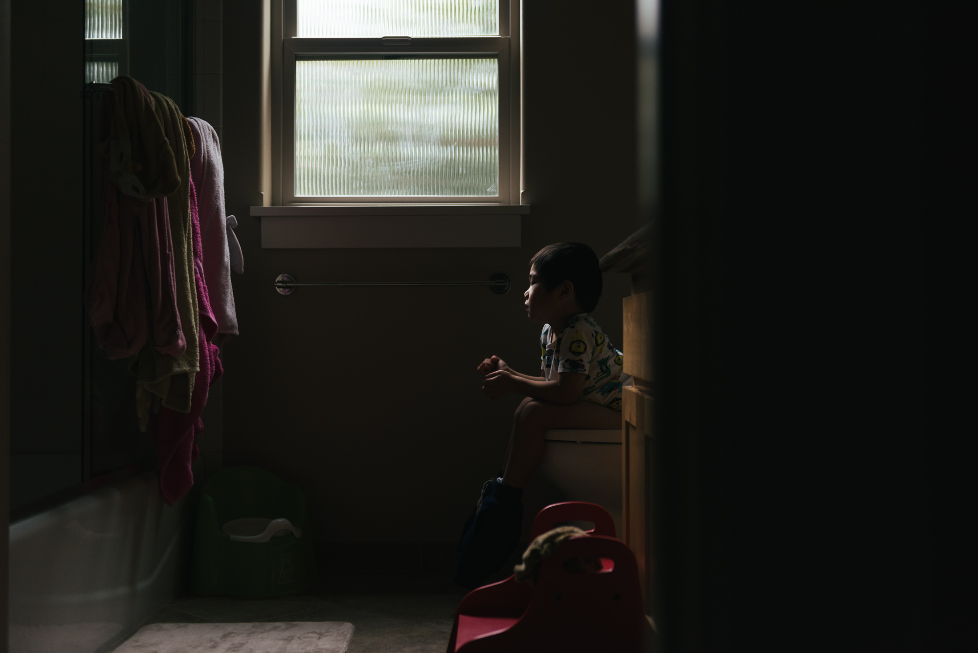 boy in bathroom - documentary family photography