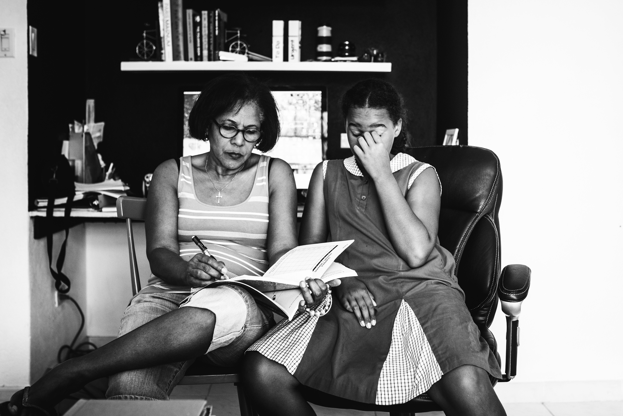 girl struggles with homework - documentary family photography