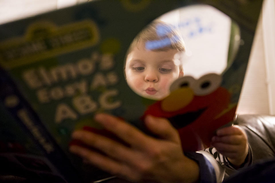 child reading book