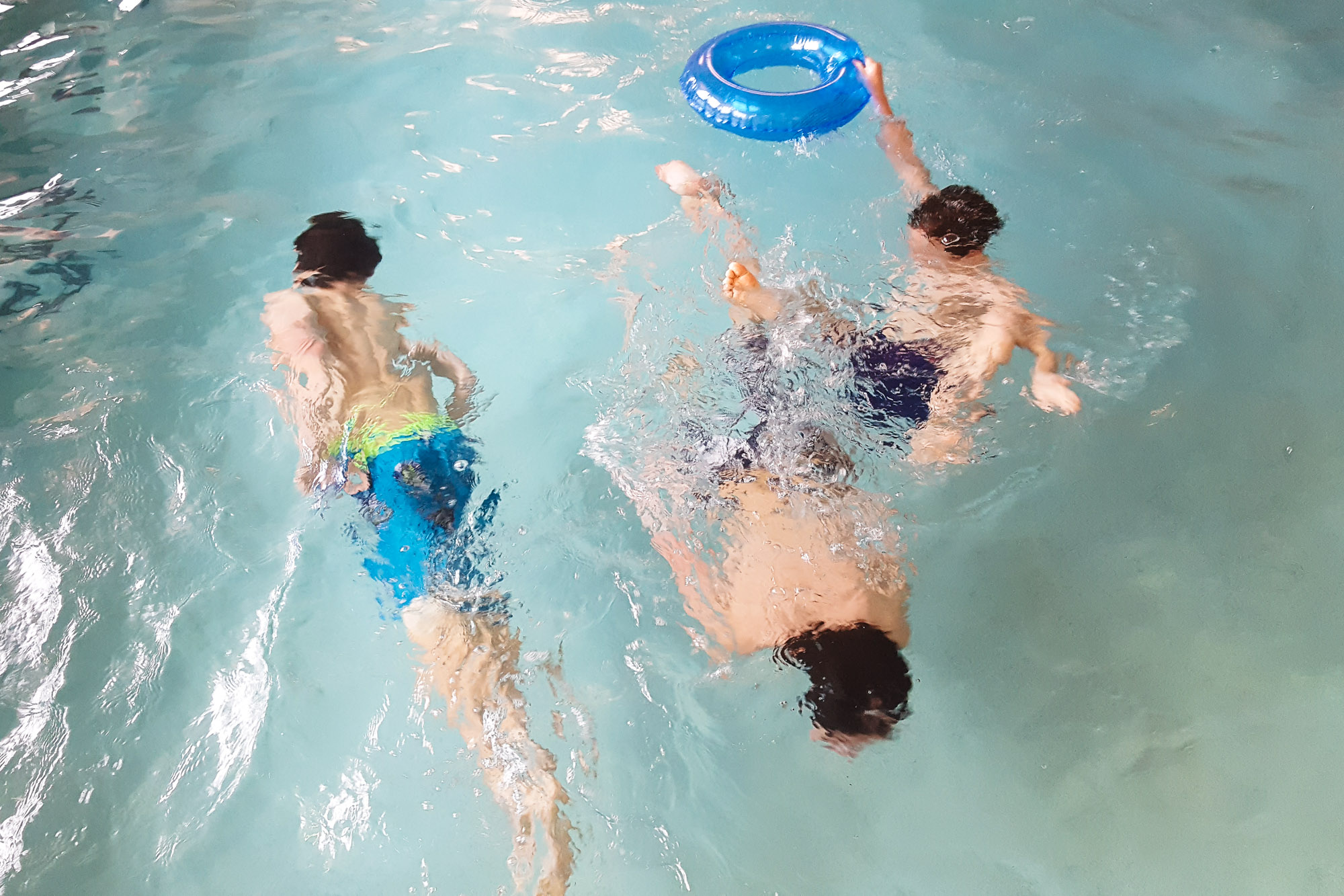 boys play in pool - Documentary Family Photography