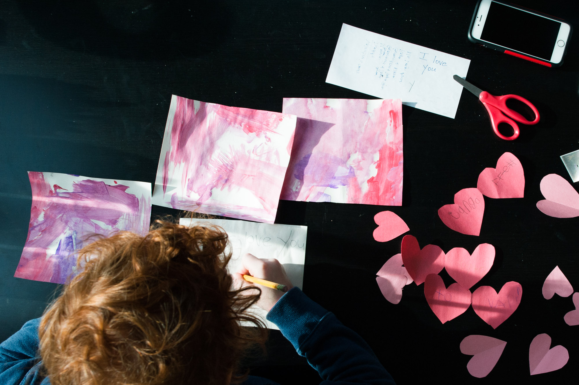 boy makes valentines - Documentary Family Photography