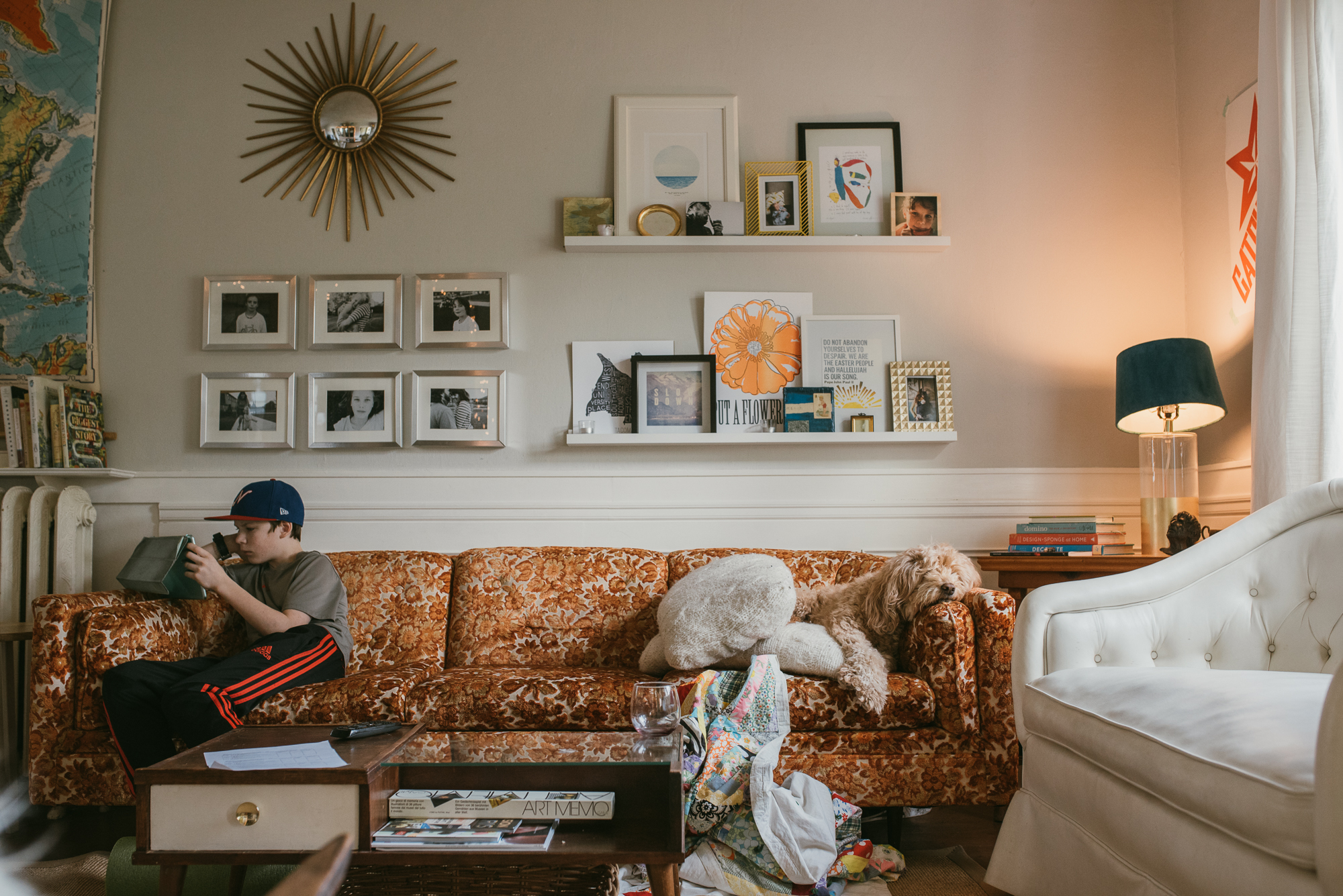 boy on couch with dog - Documentary Family Photography