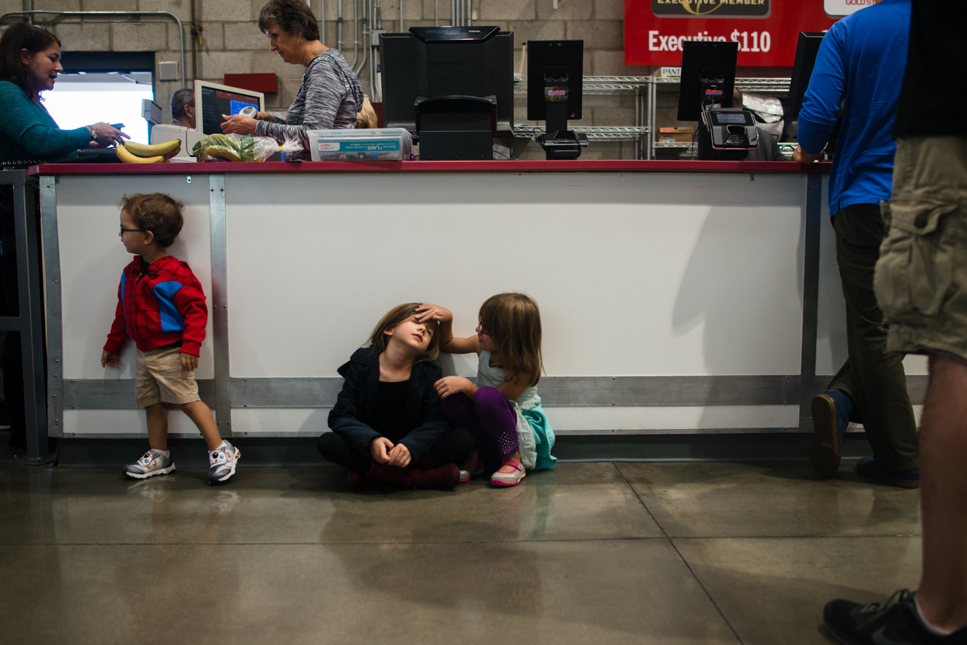 kids waiting at register - Documentary Family Photography