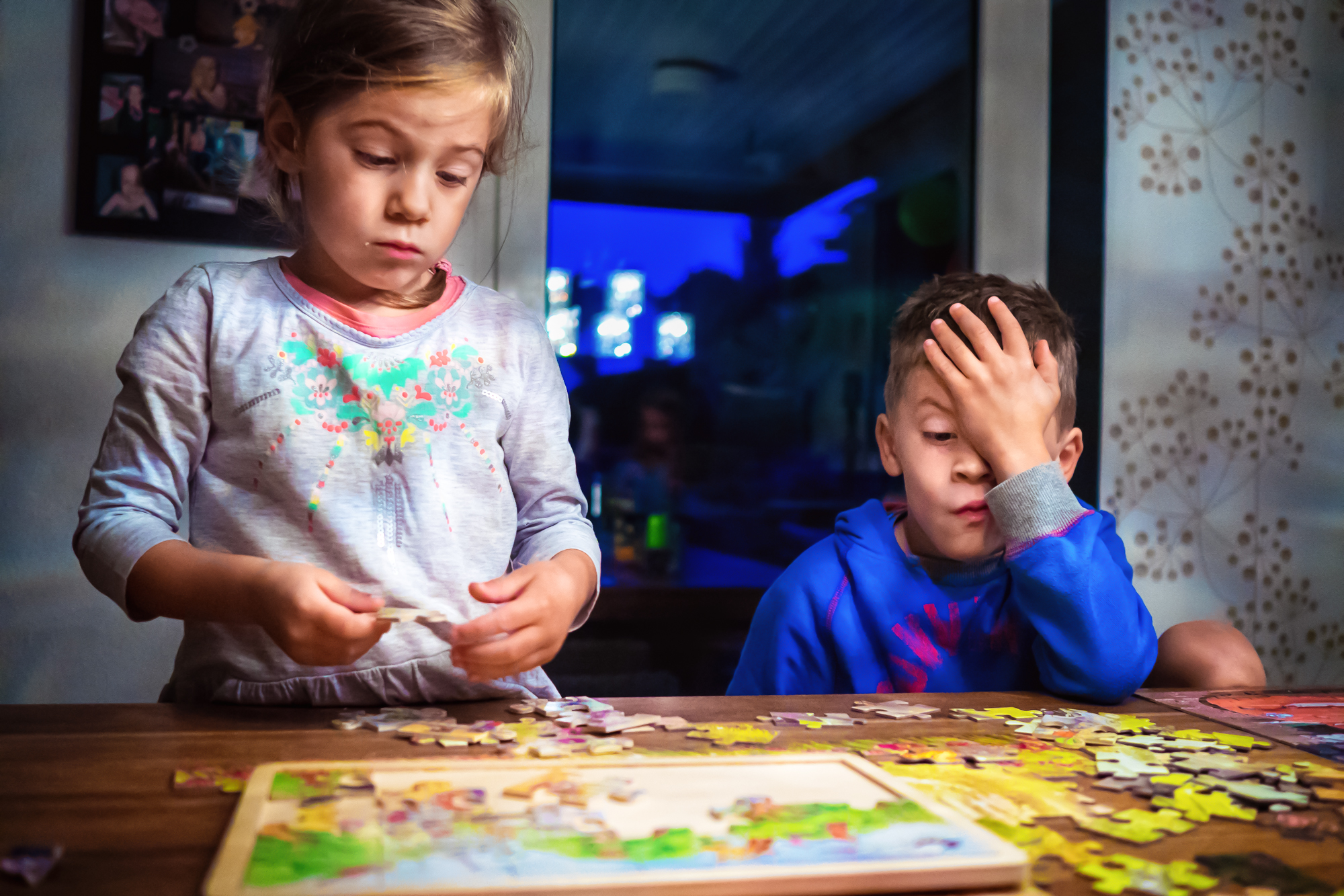 kids work on puzzle - Documentary Family Photography