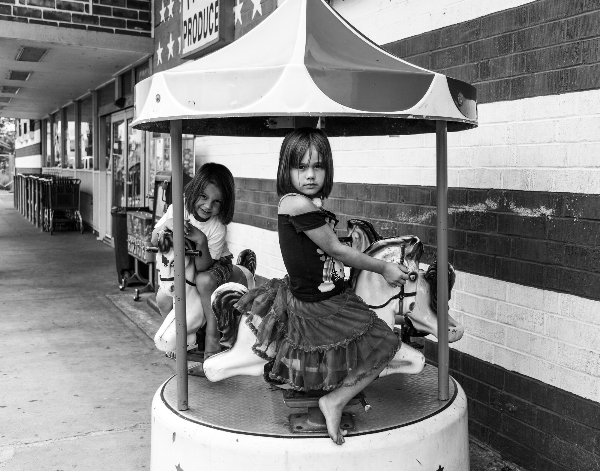 girls on quarter machine carousel