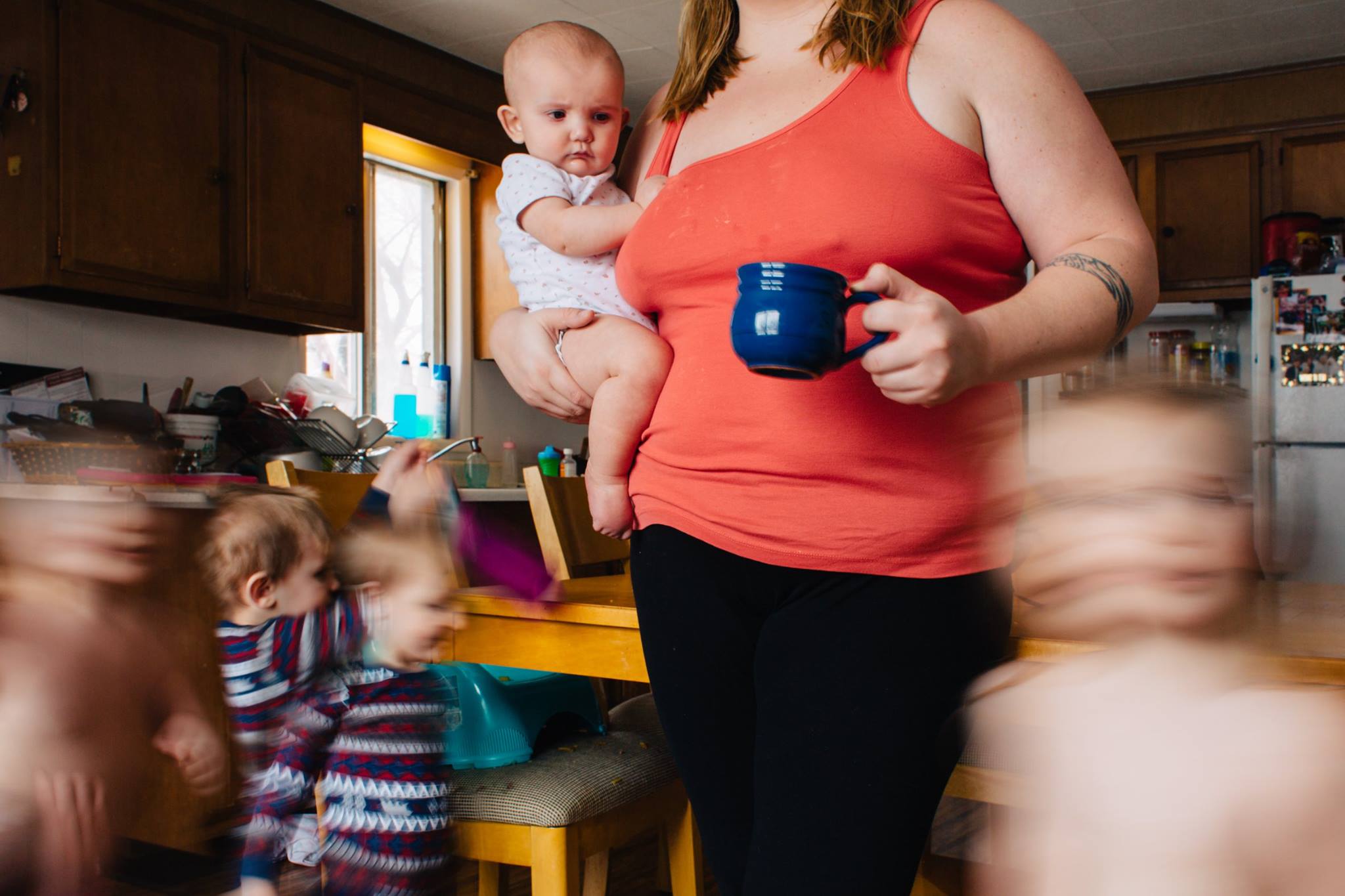 kids running around mother - Documentary Family Photography