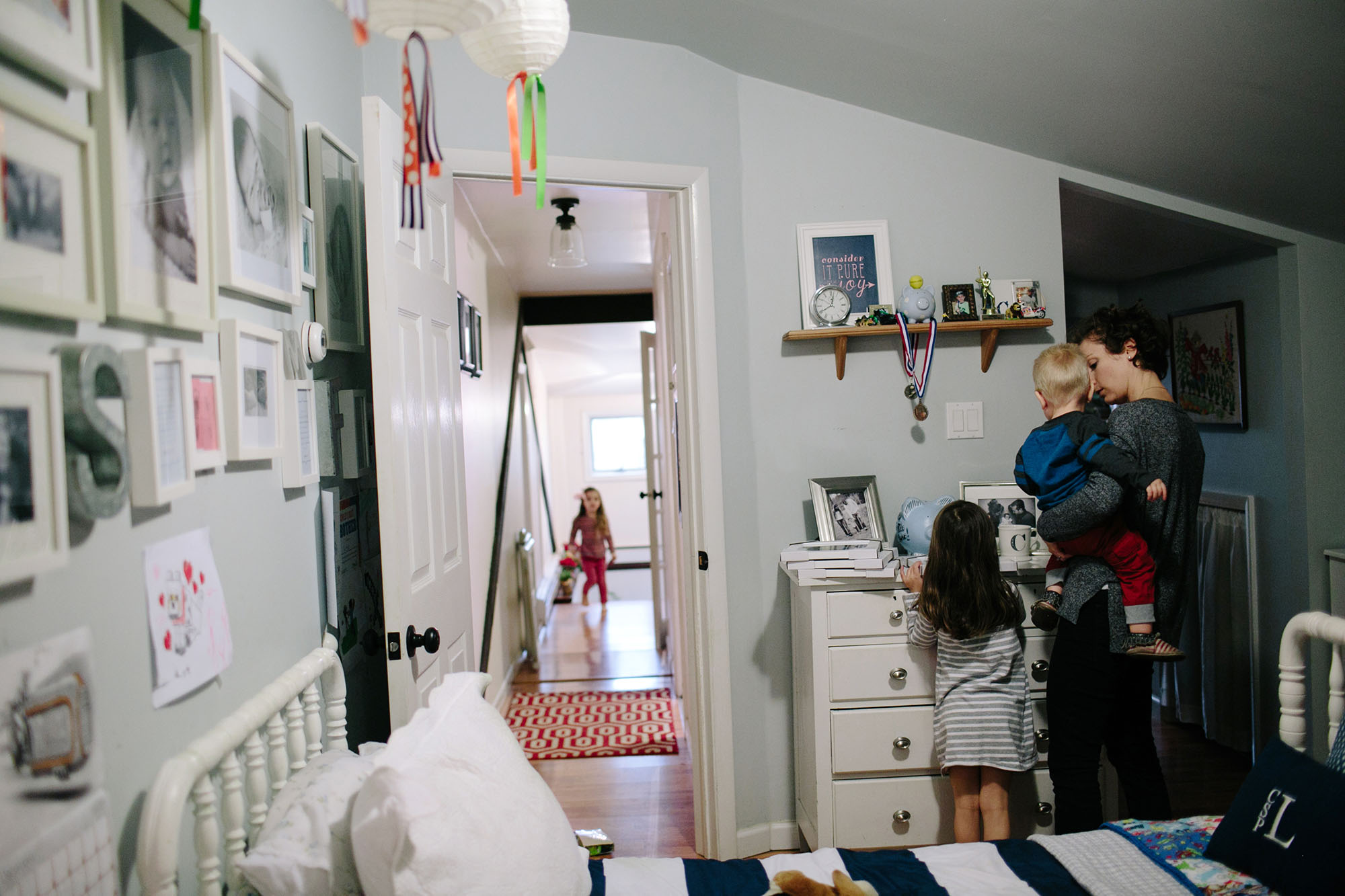 mother and daughter in child's bedroom - documentary family photography