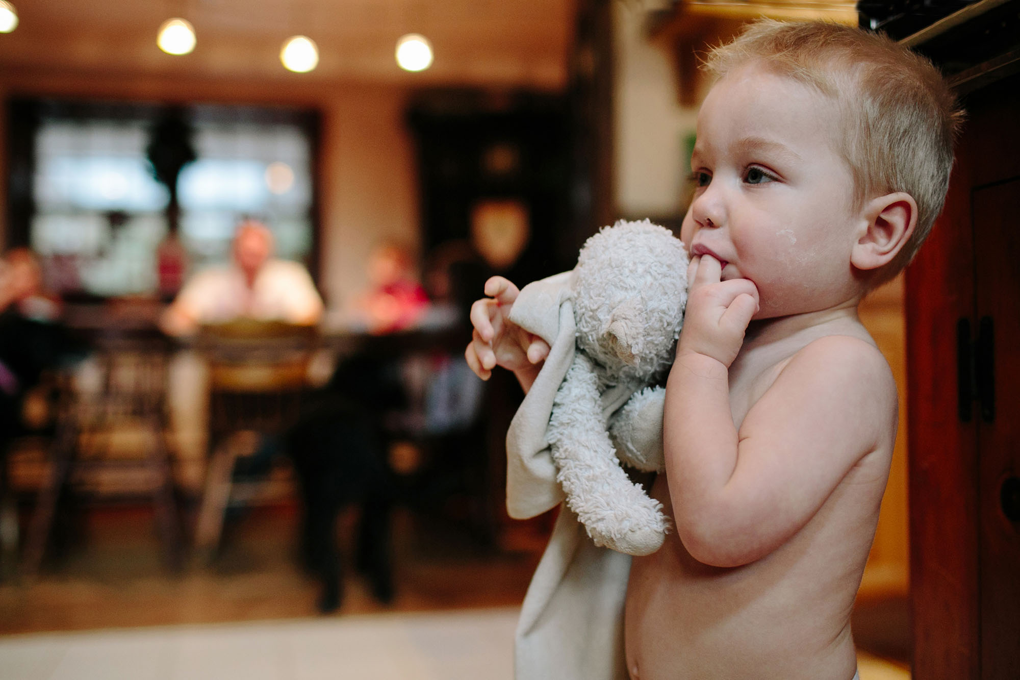 child with stuffed animal - documentary family photography