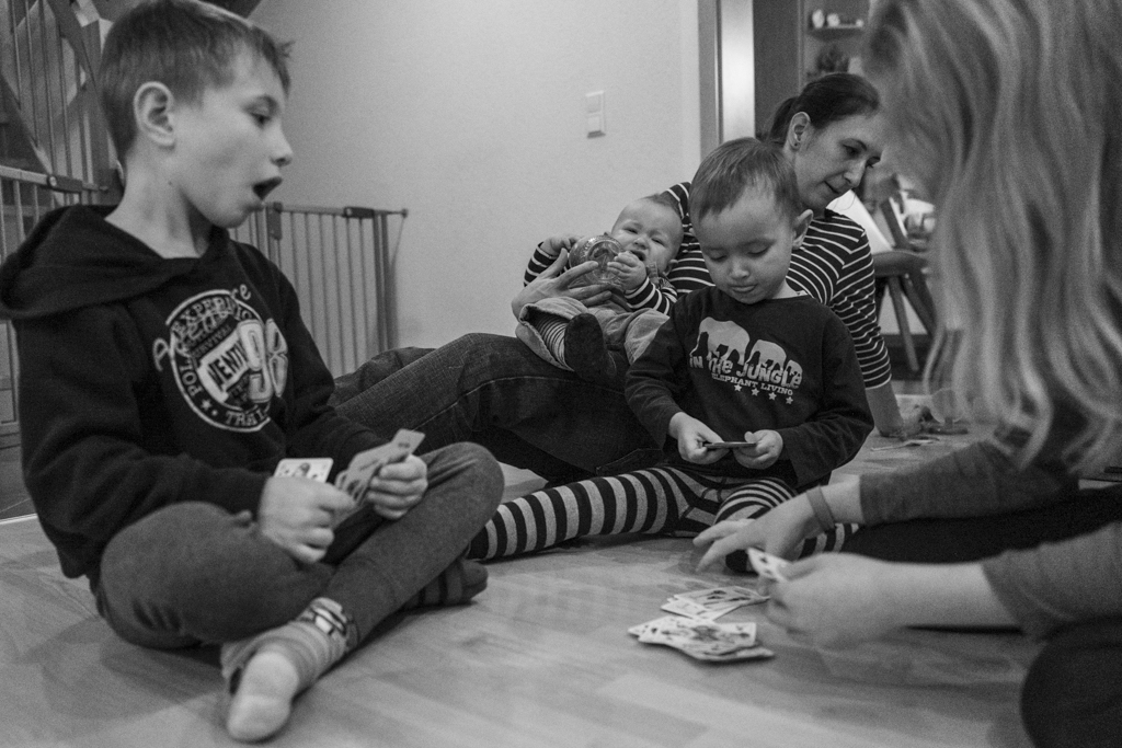 family playing on floor