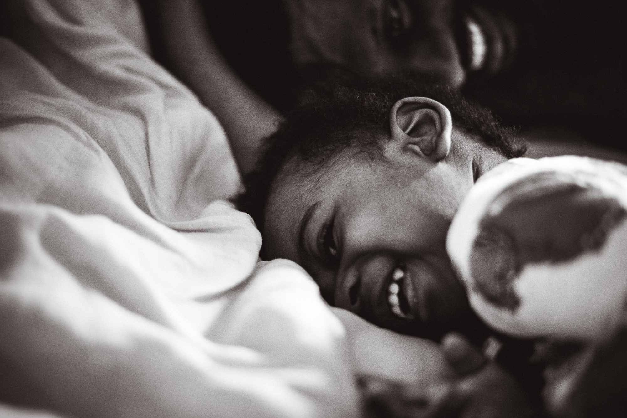 boy laughing - Documentary Family Photography