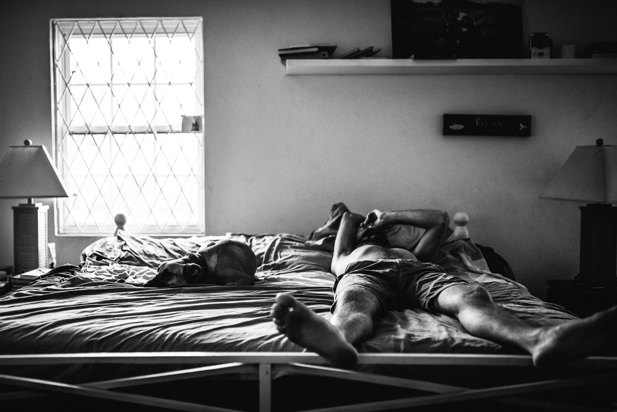 Man asleep on bed - Documentary Family Photography