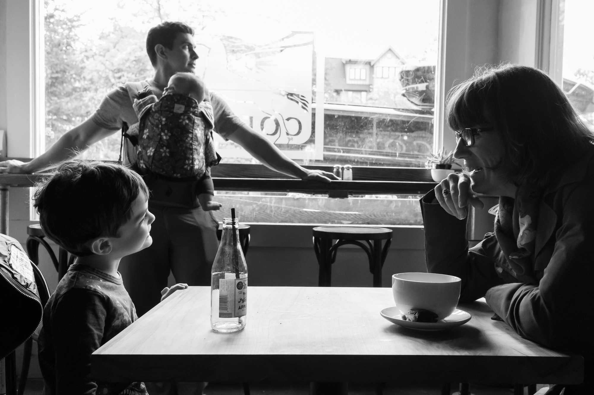 family in coffee shop - documentary family photography