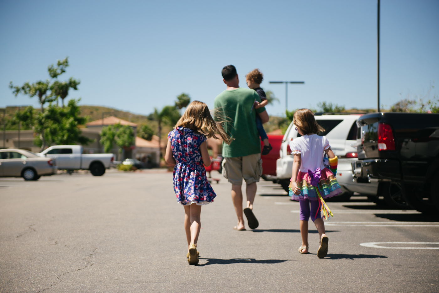 family in parking lot - documentary family photography