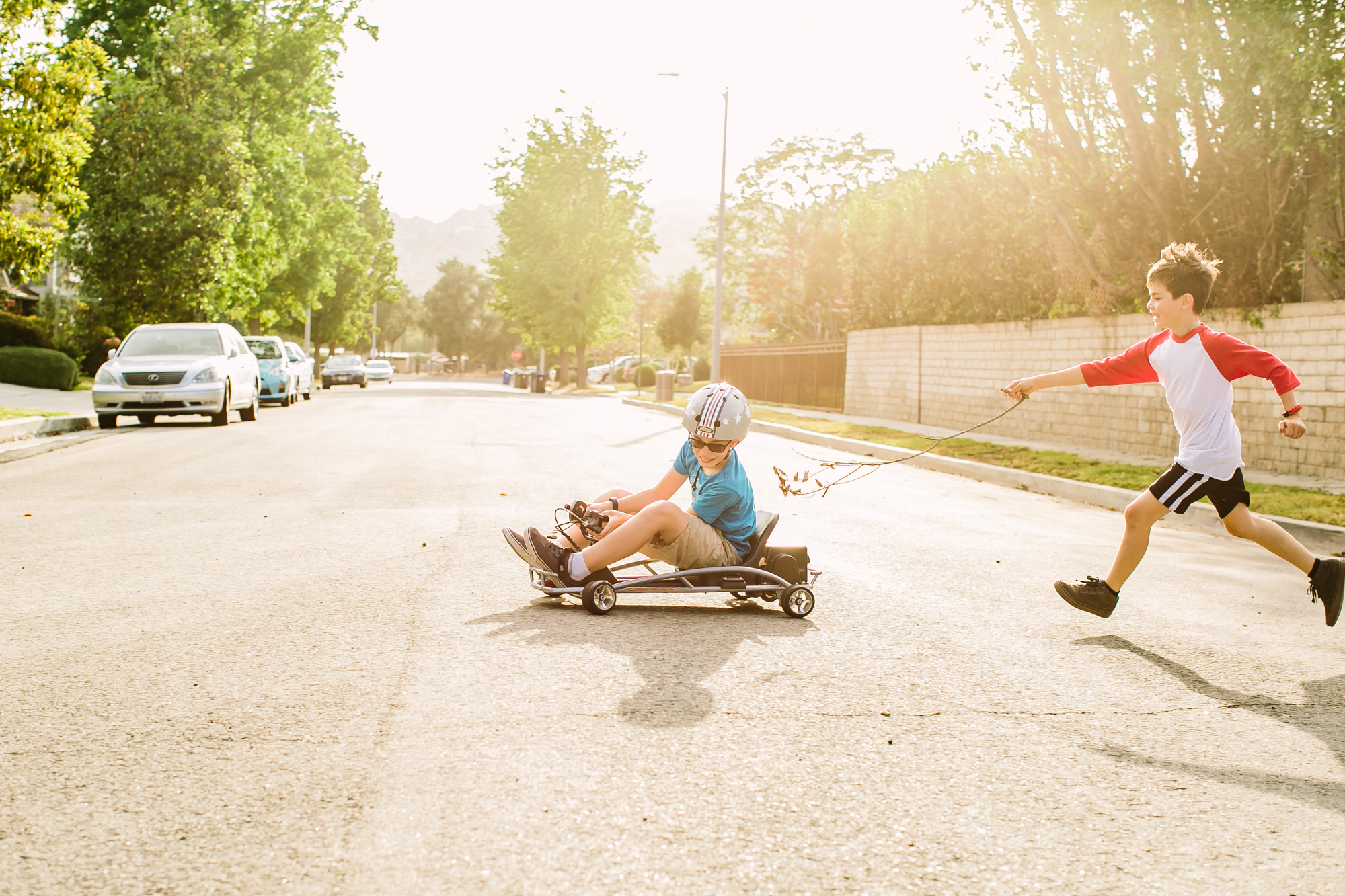 kids play in street - documentary family photography