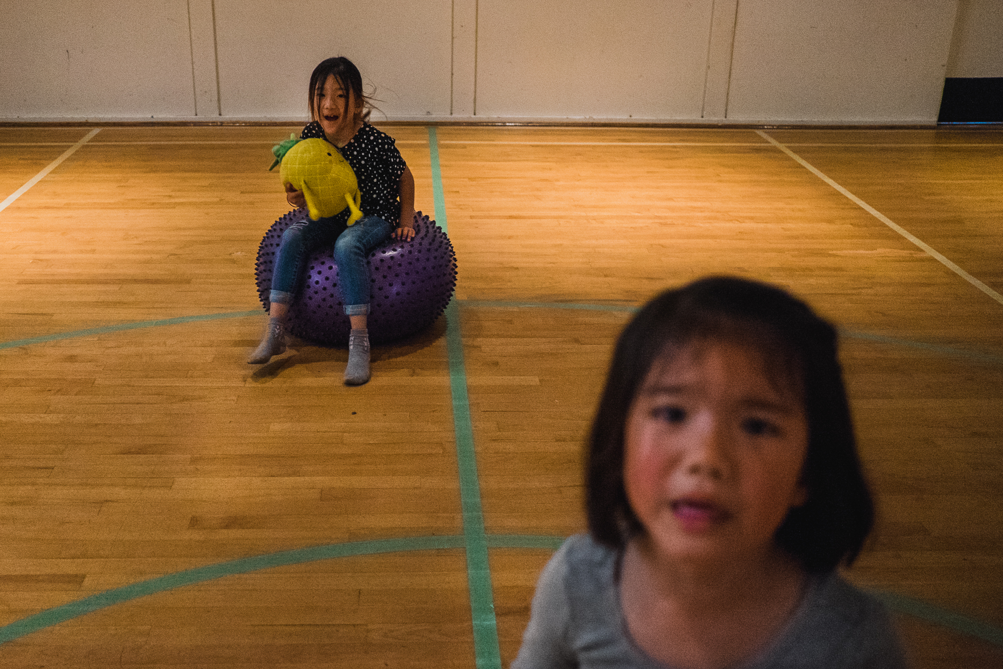 girls on exercise ball - documentary family photography
