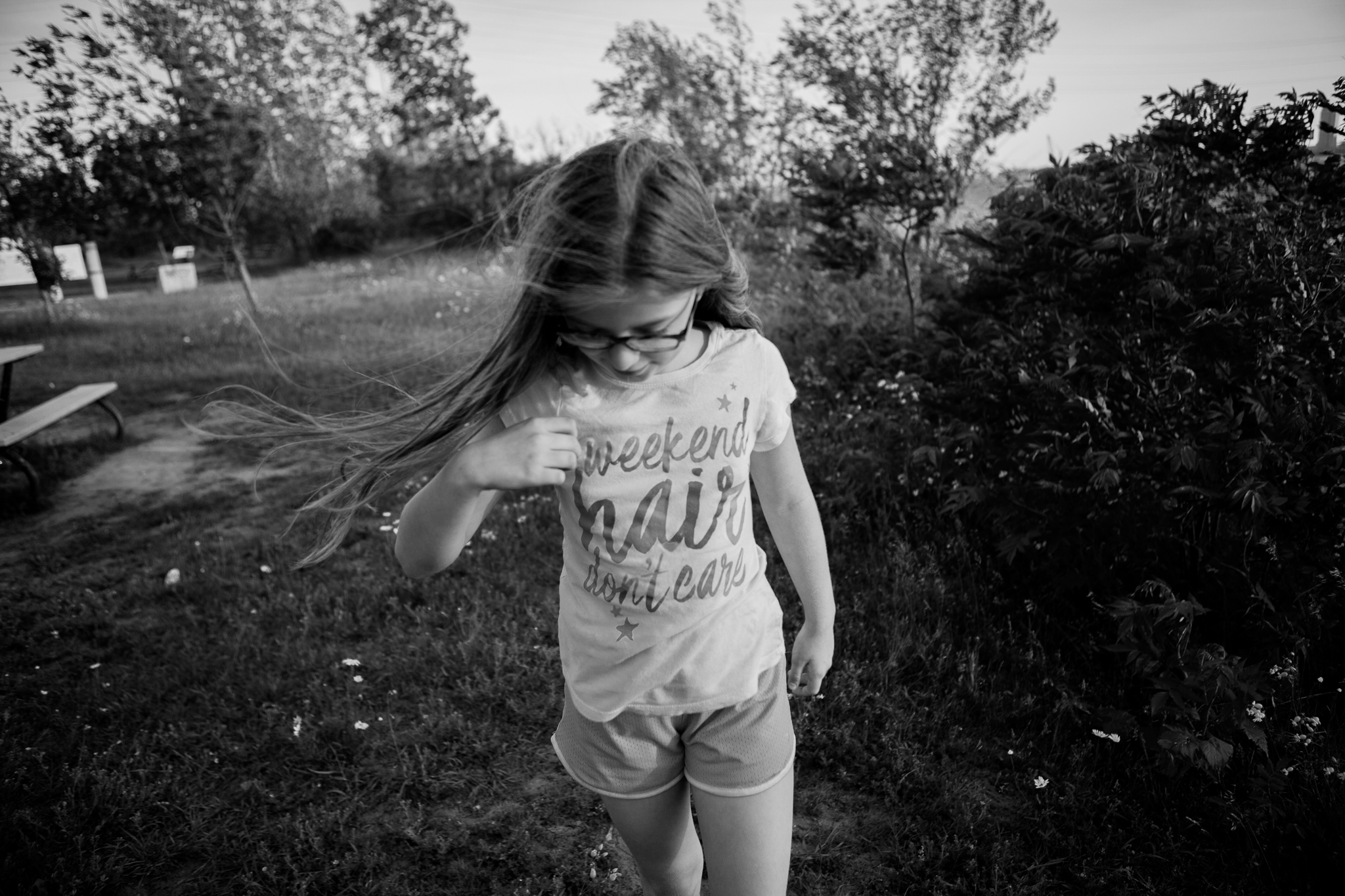 girl with wind blowing in hair - Documentary family photography