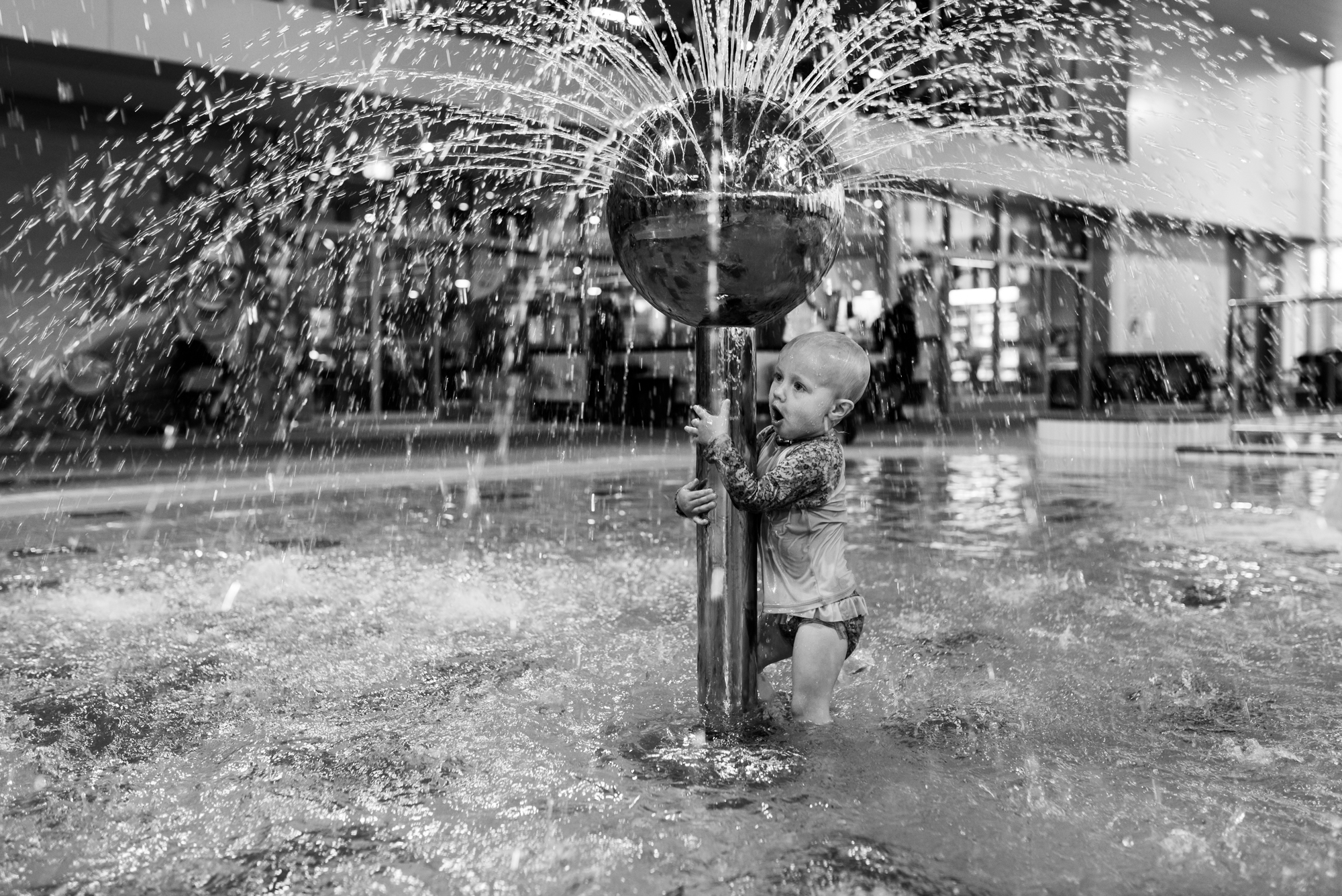 child at fountain - Documentary Family Photography