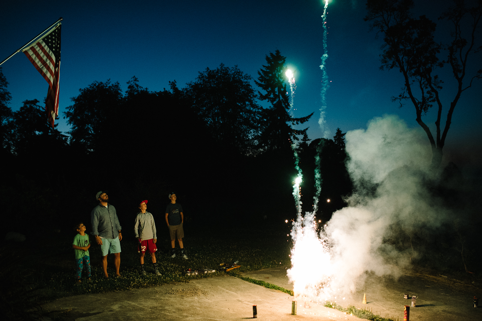 family shoots off fireworks - Documentary Family Photography