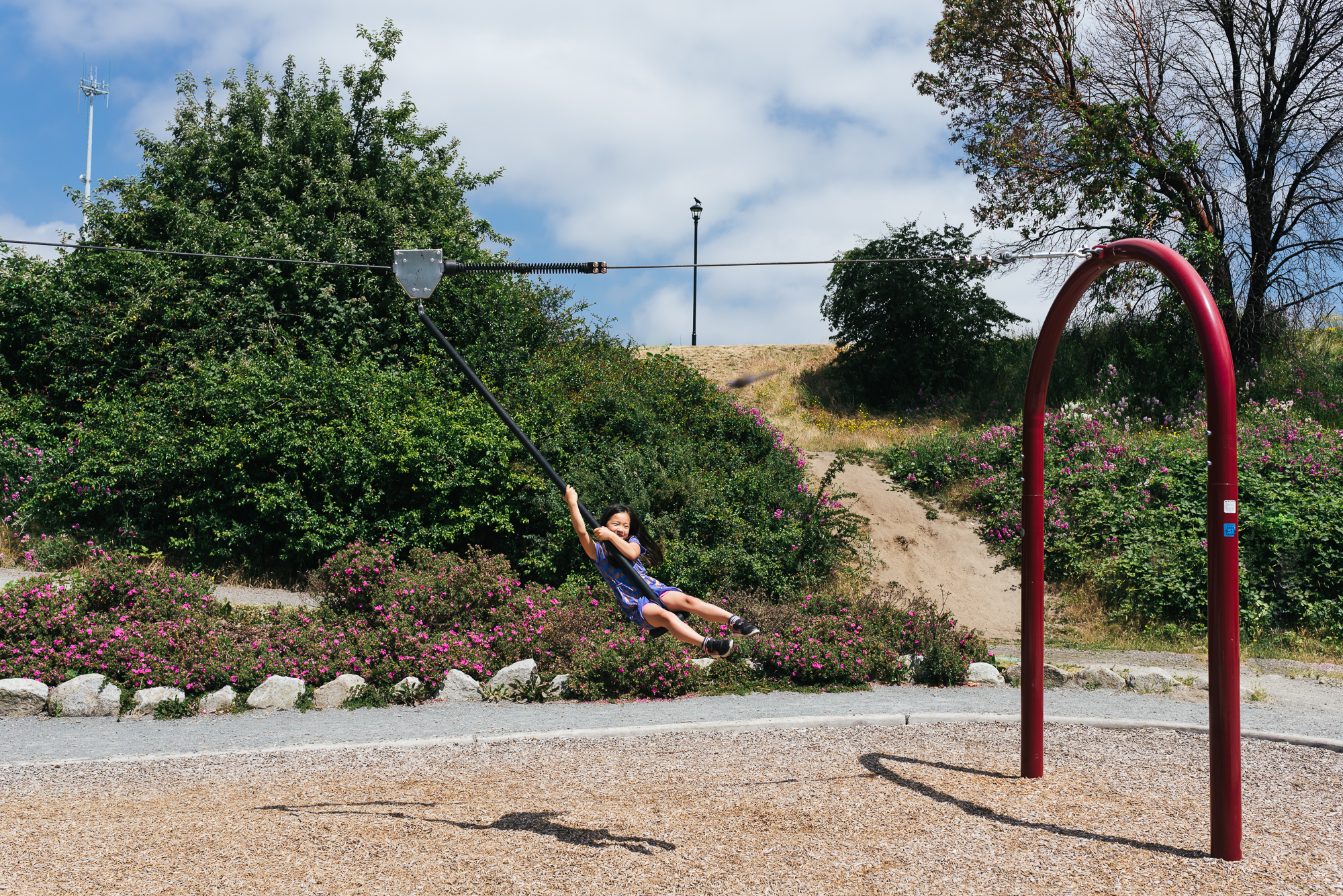 girl on swing at park - Documentary Family Photography