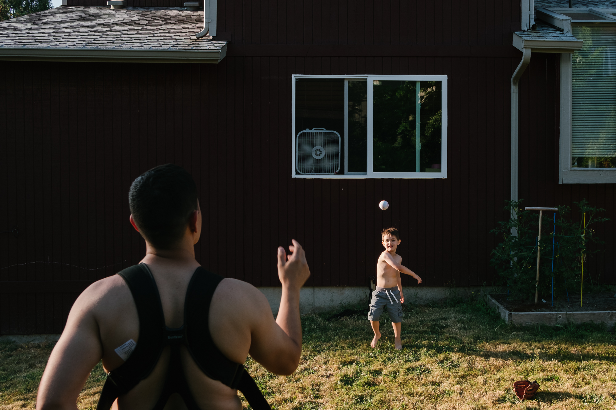 father and son play catch - Documentary Family Photography