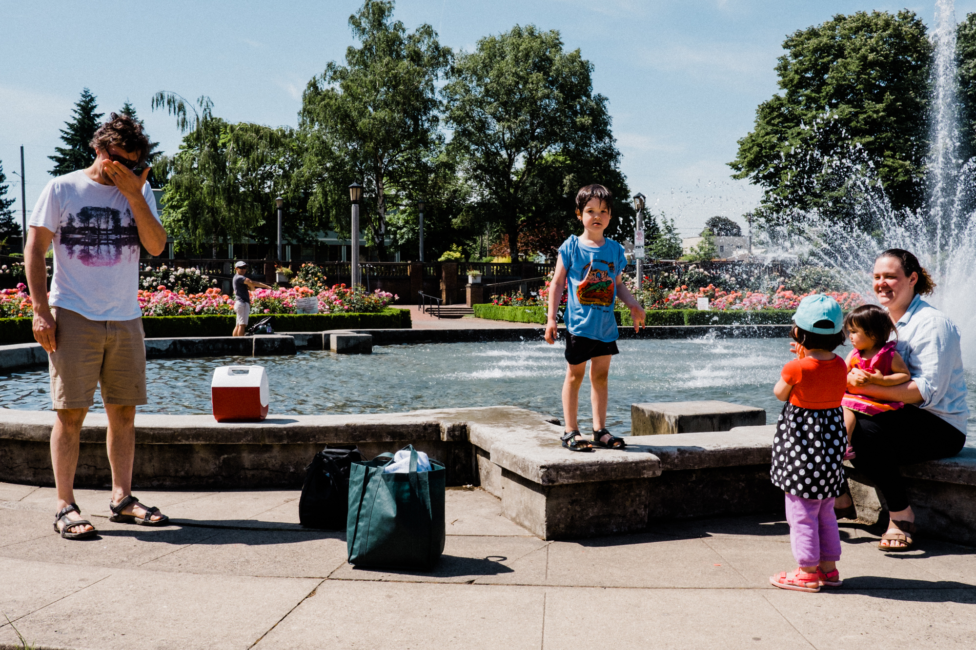 wet child at fountain - Documentary Family Photography