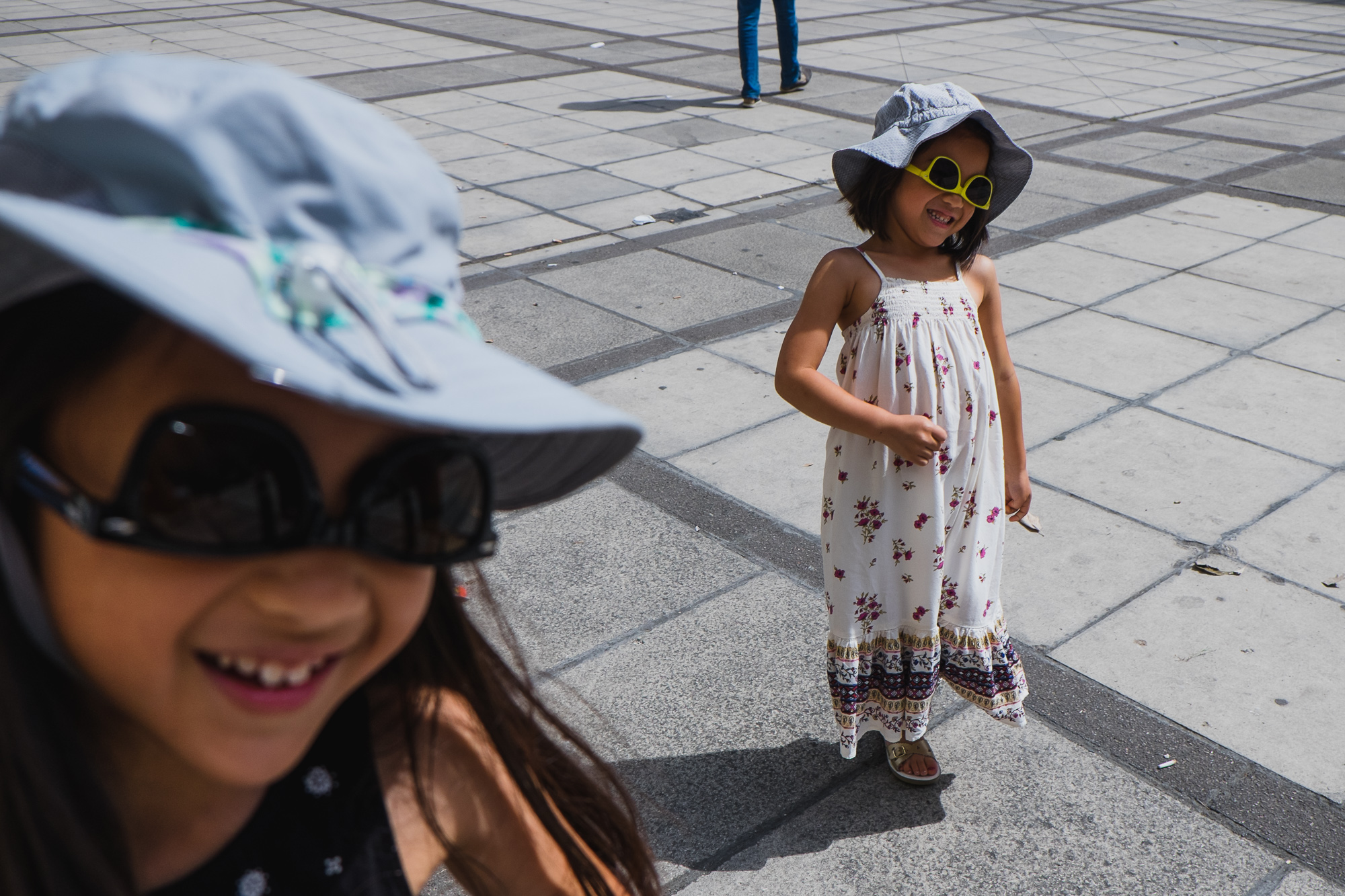 girls in hats - documentary family photography