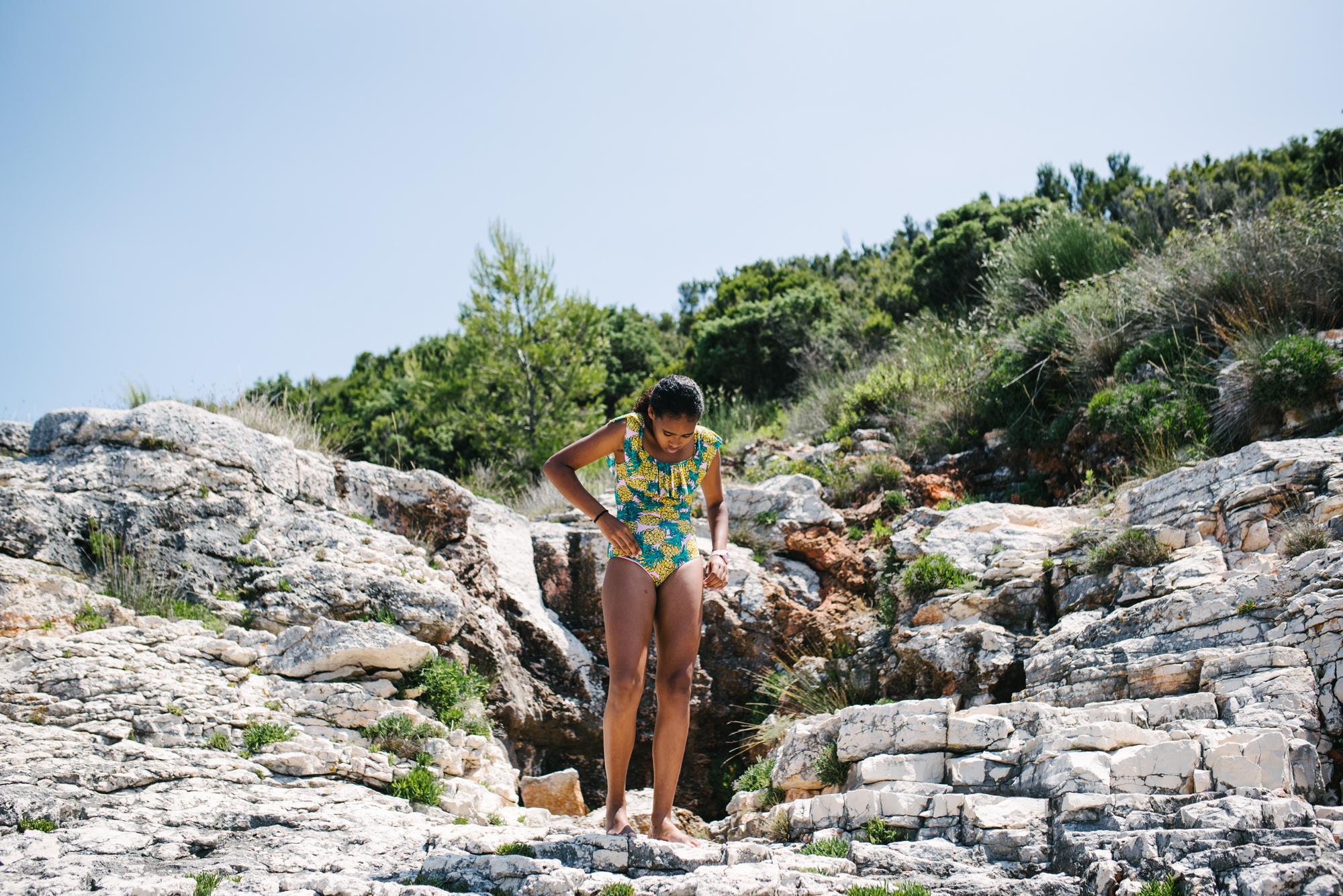 girl on cliff in swimsuit - Documentary Family Photography