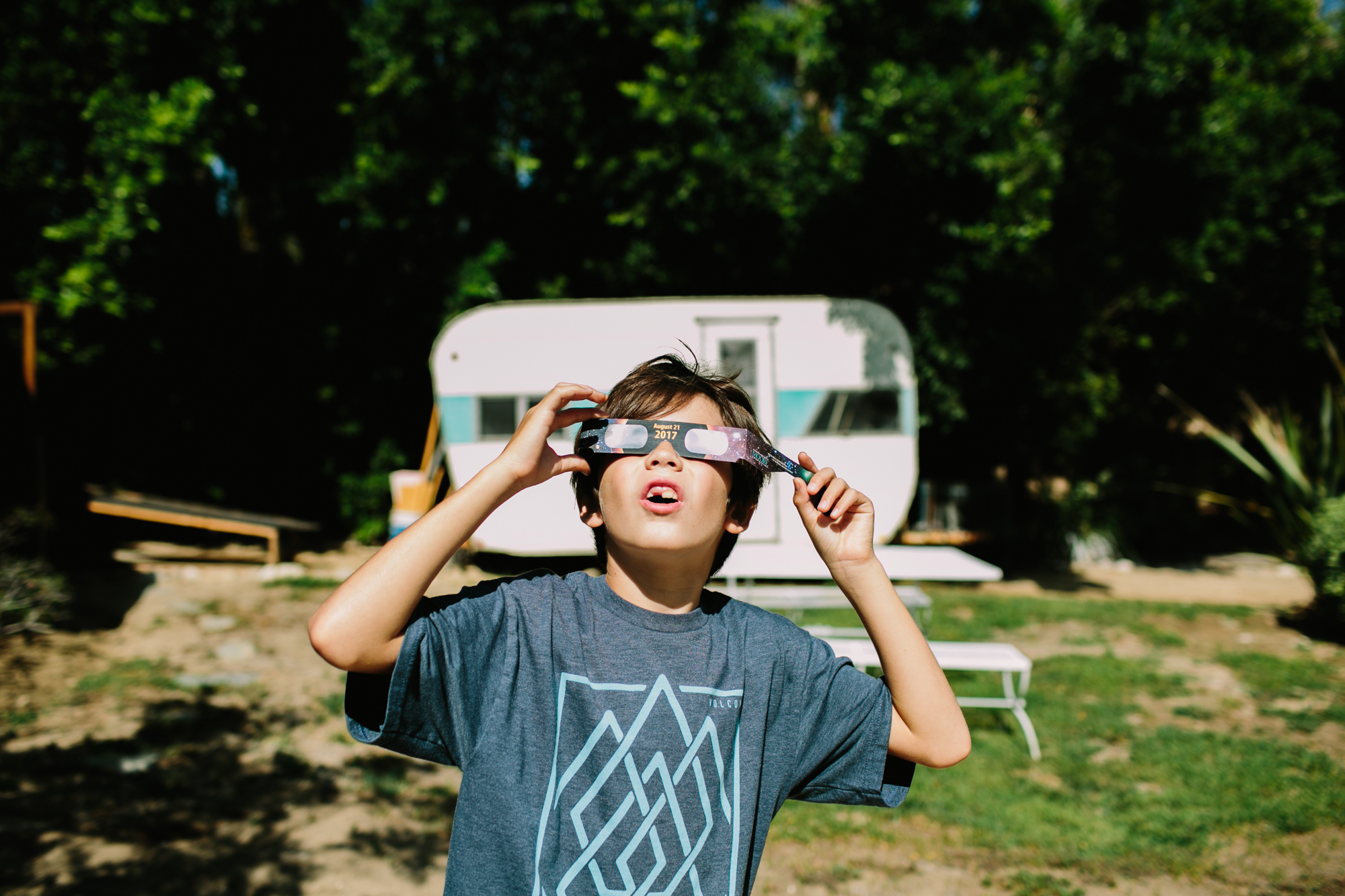 boy with eclipse glasses - documentary family photography