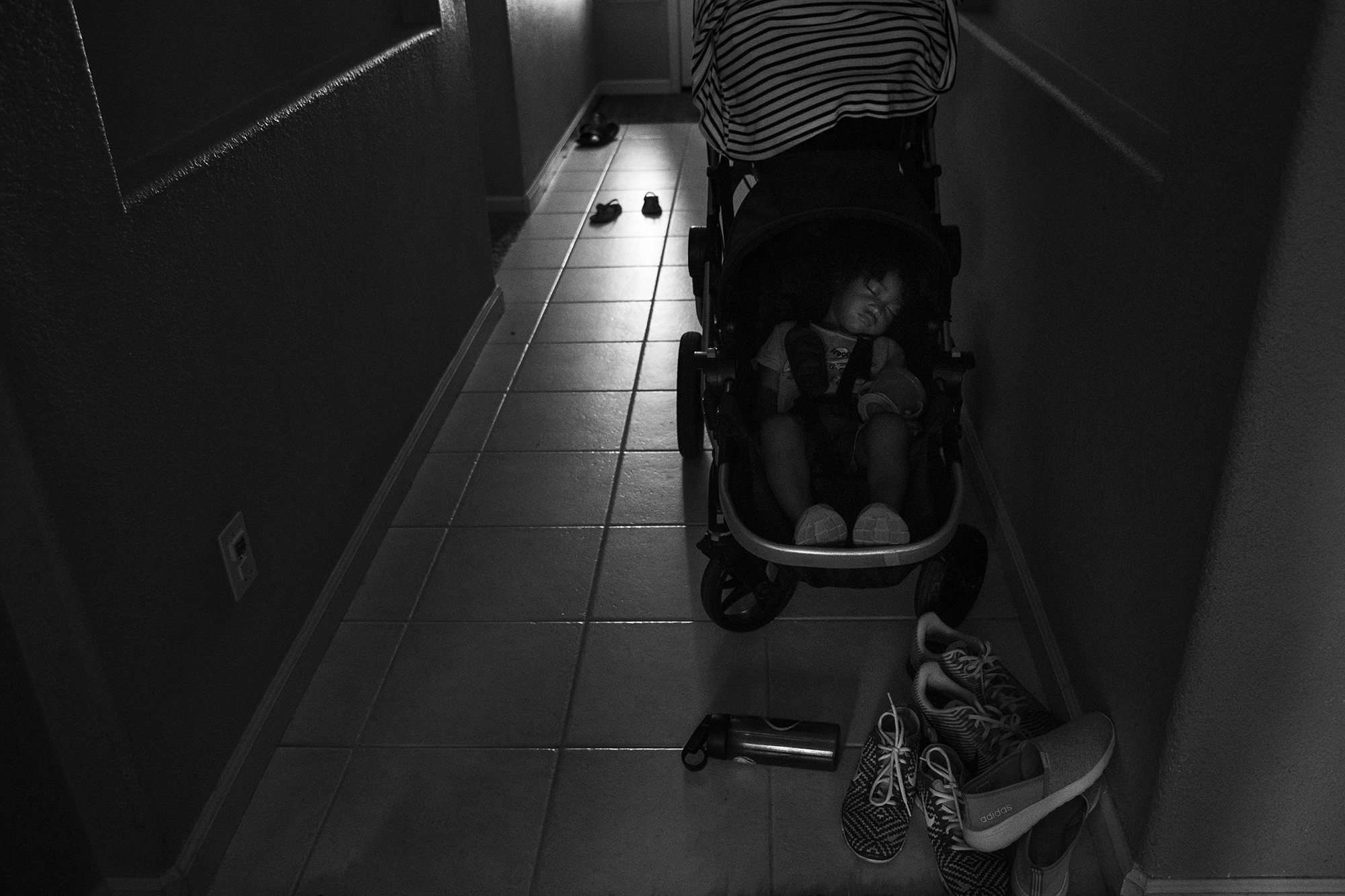 child asleep in stroller - Documentary Family Photography
