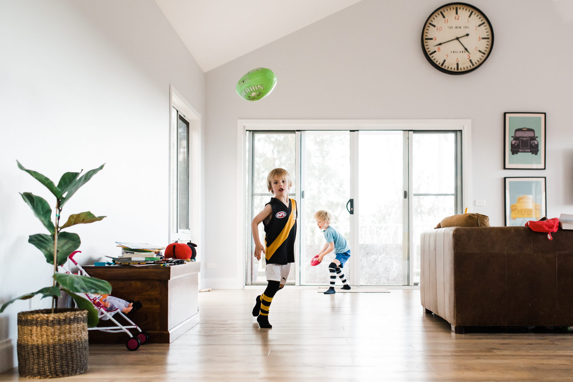 kids play ball in house -Documentary Family Photography