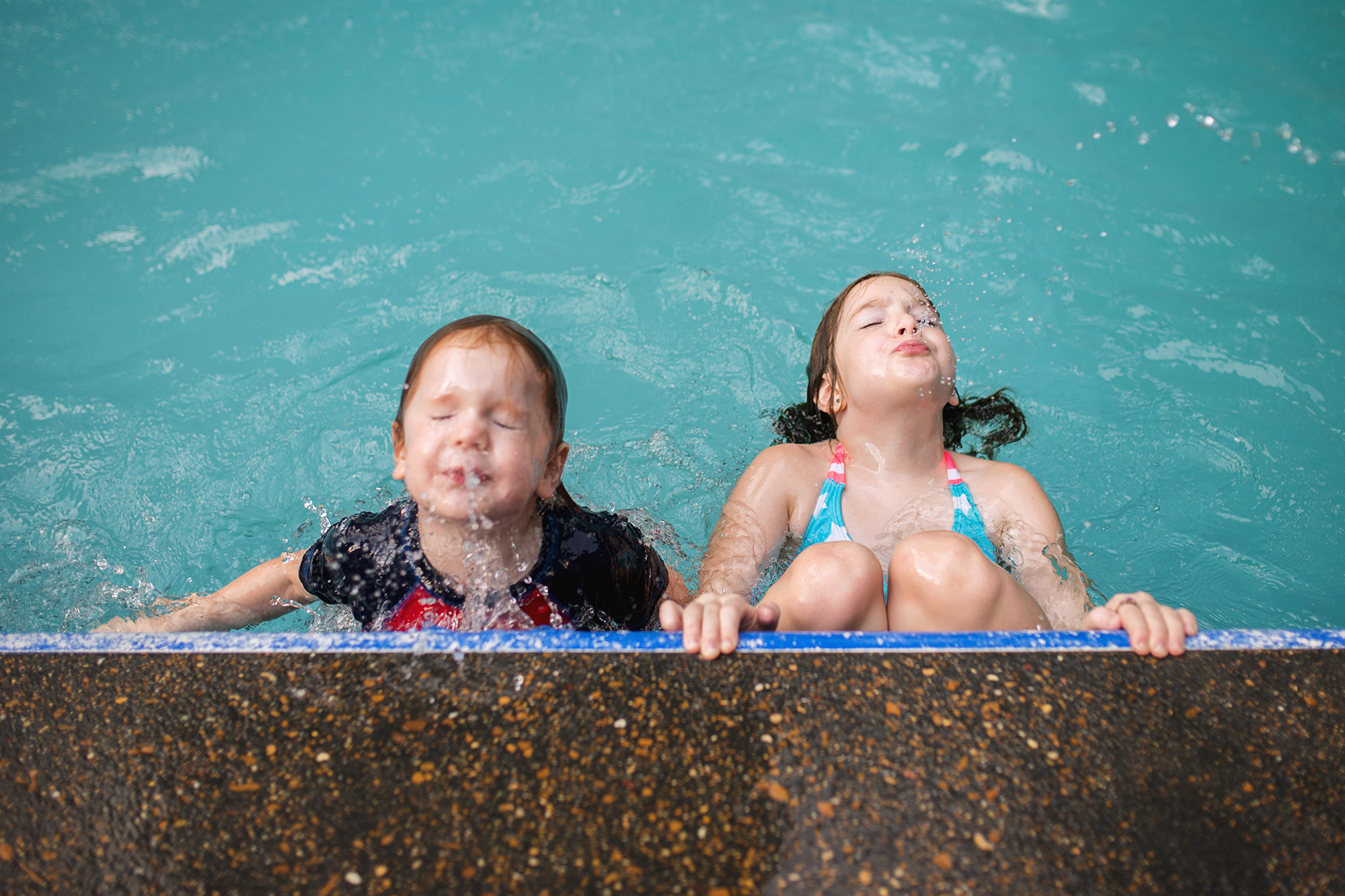 kids at edge of pool - Documentary Family Photography