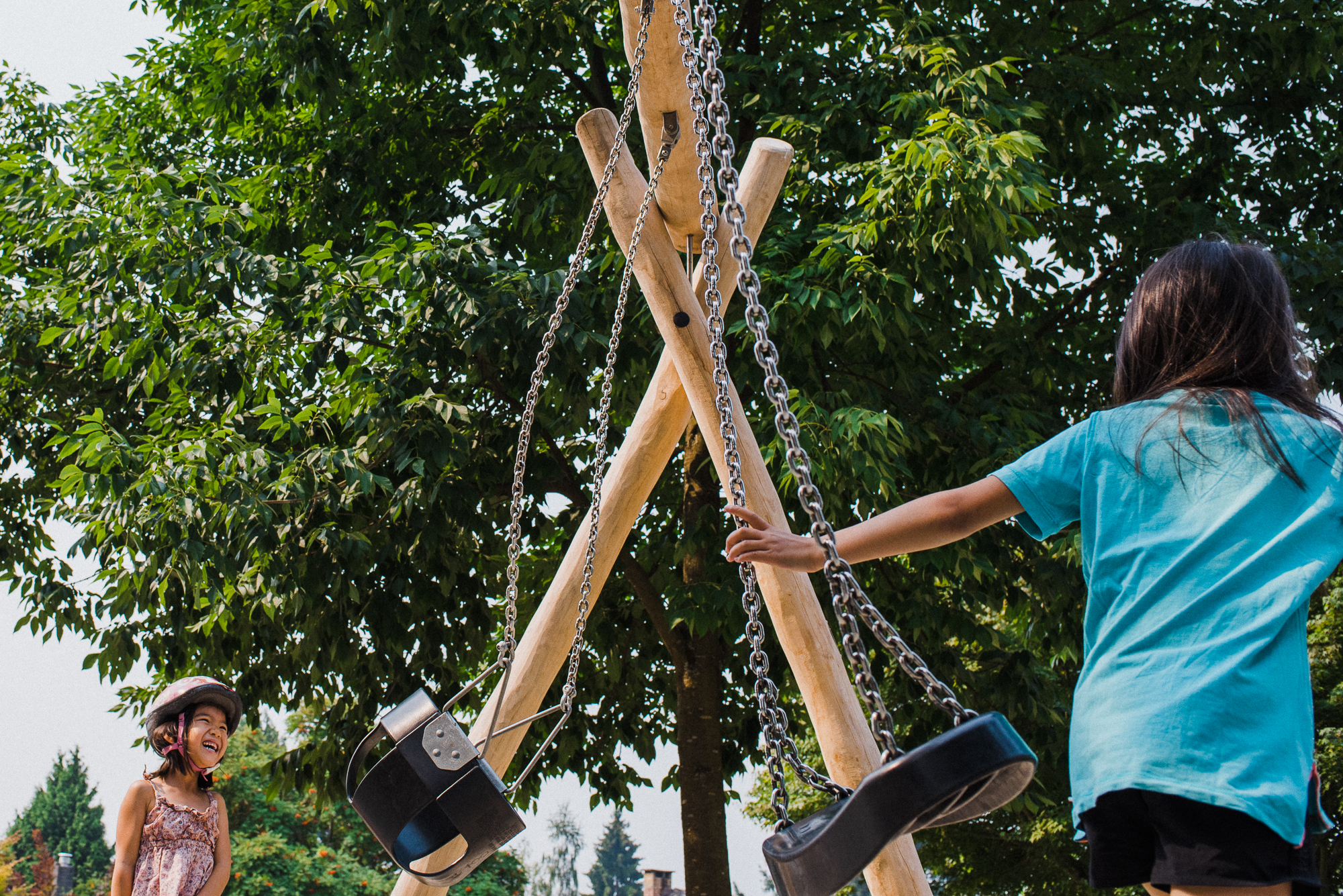 kid jumps off swing - Documentary Family Photography