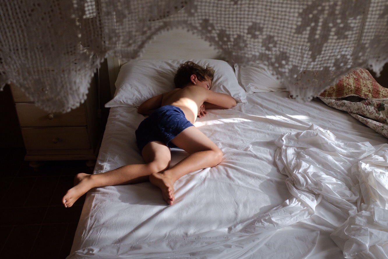 boy asleep on bed - Documentary Family Photography
