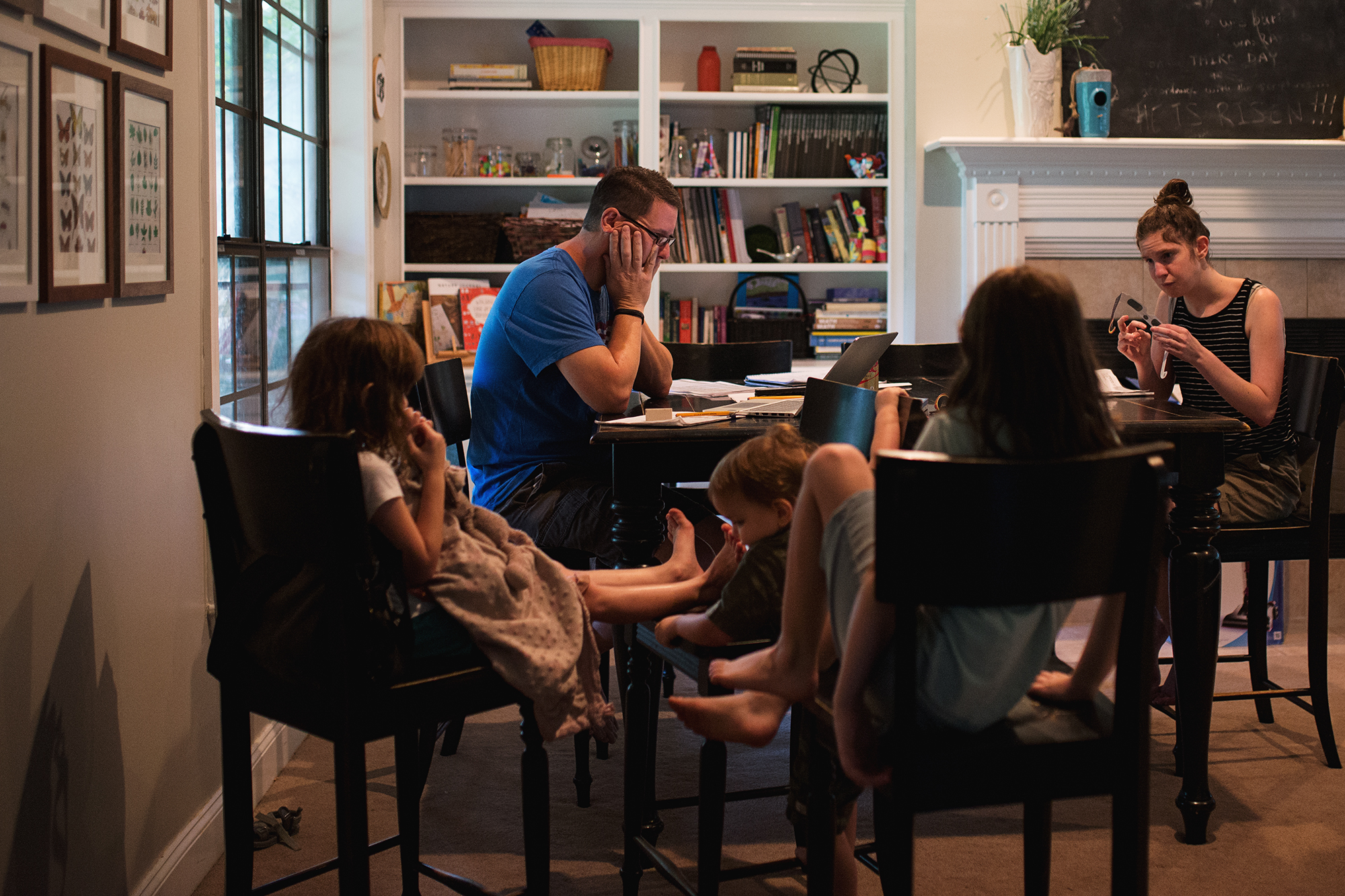 man at table with children - Documentary Family Photography