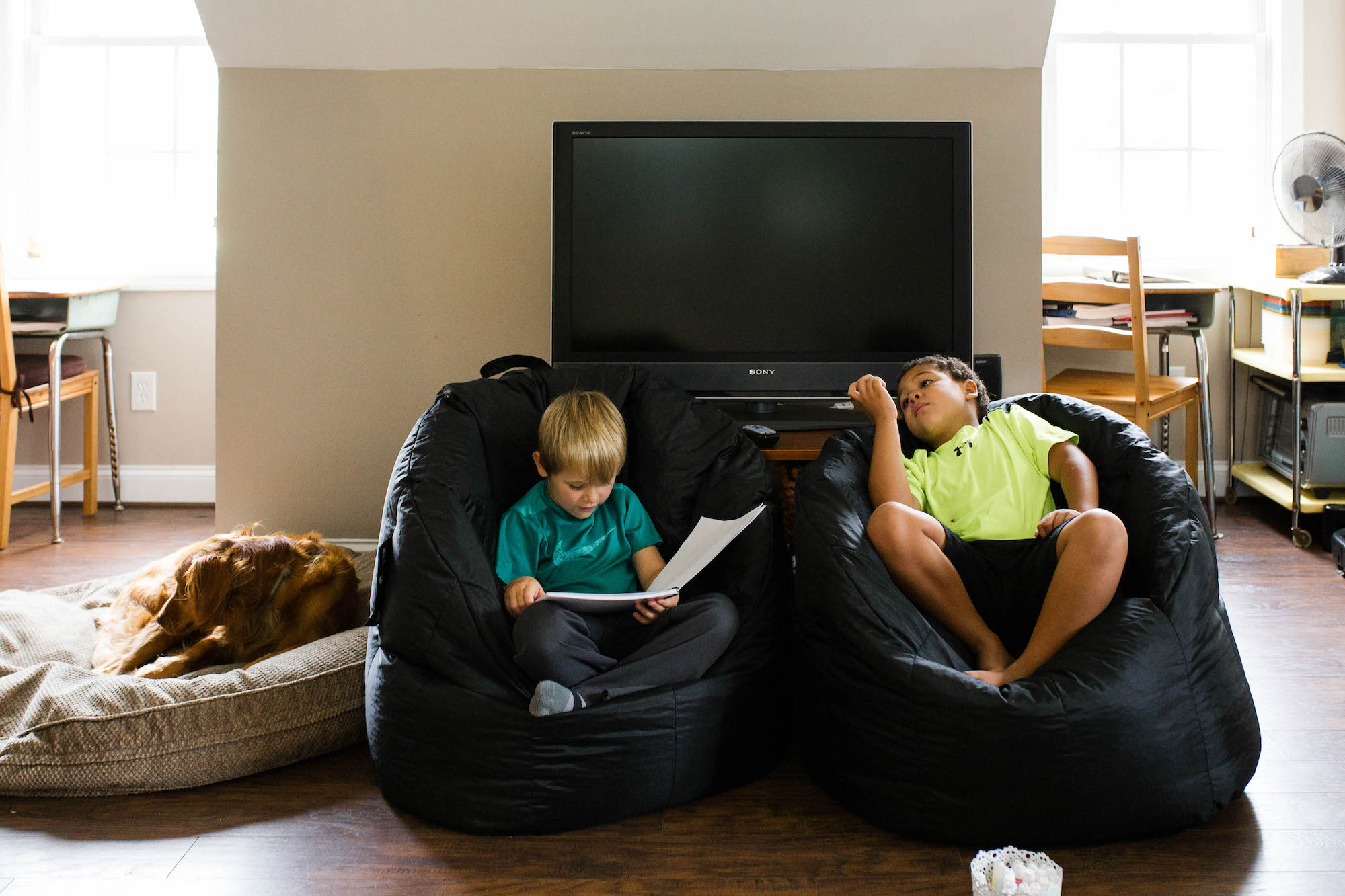kids sitting in beanbag chairs - Documentary Family Photography