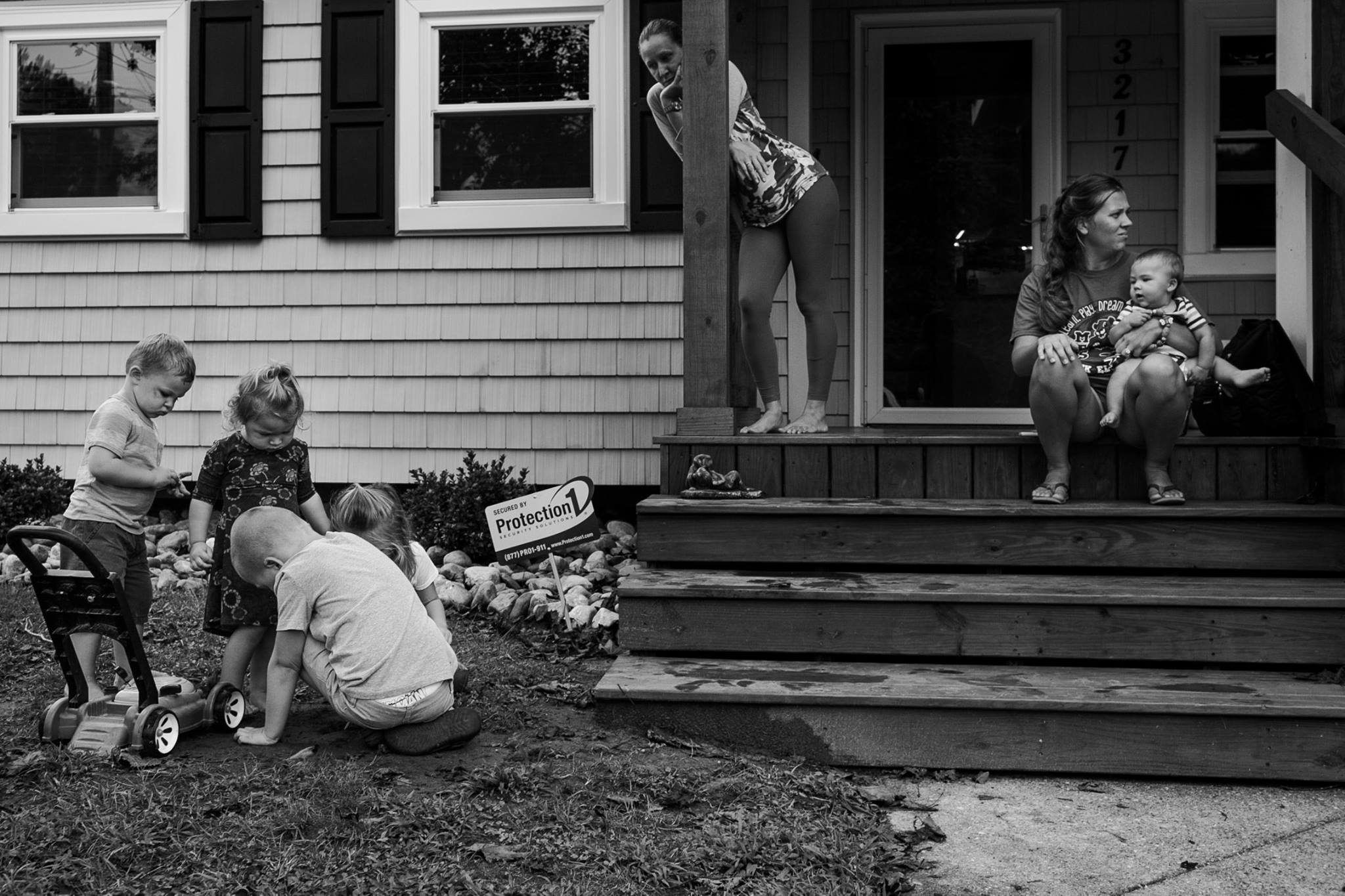 kids play on front porch - Documentary Family Photography