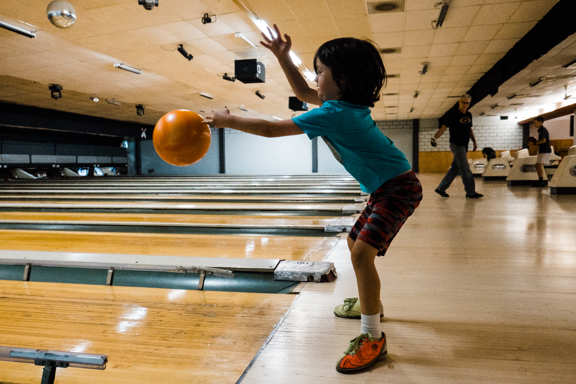 child bowling -Documentary Family Photography