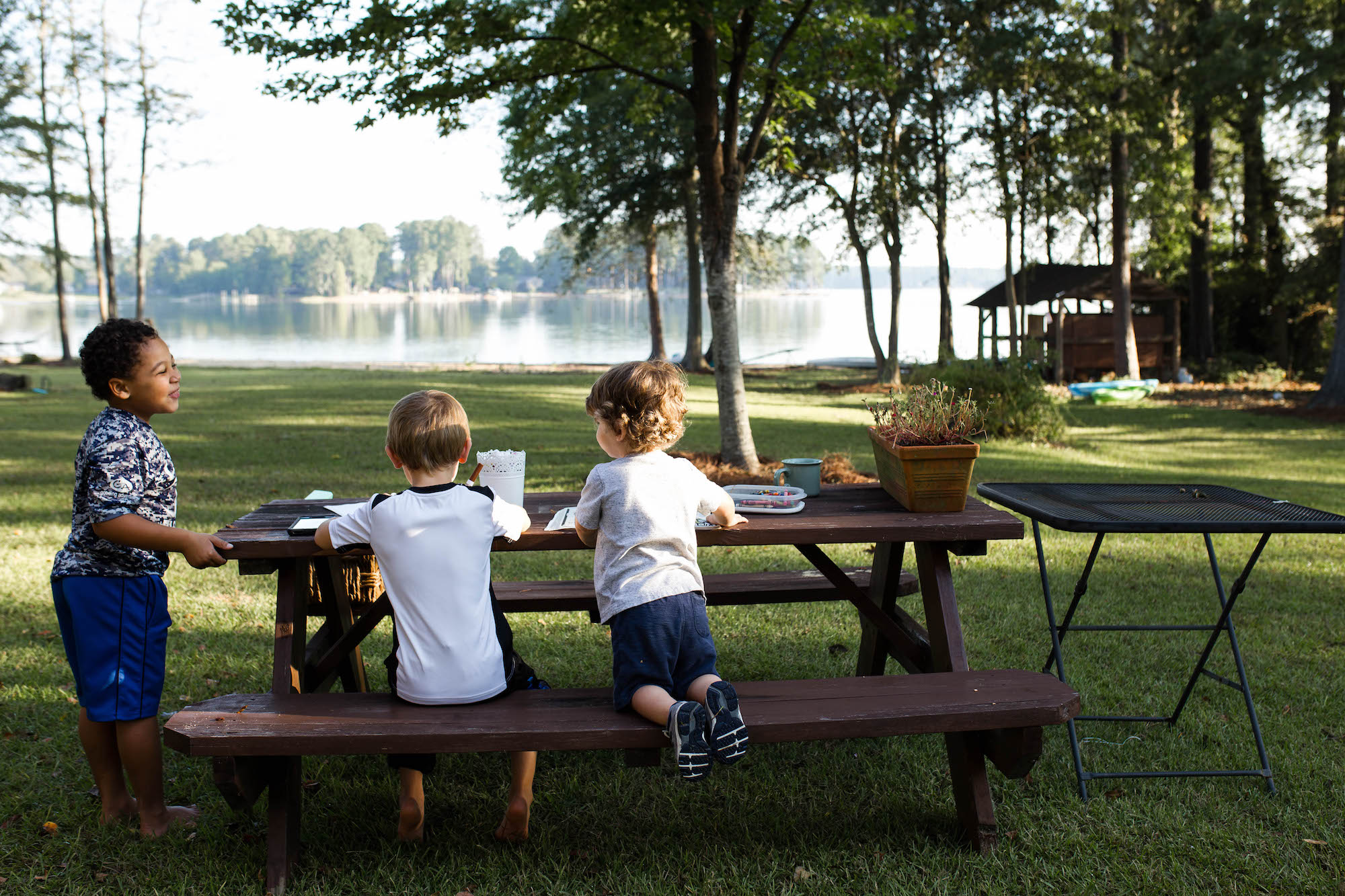 kids at picnic table - documentary family photography