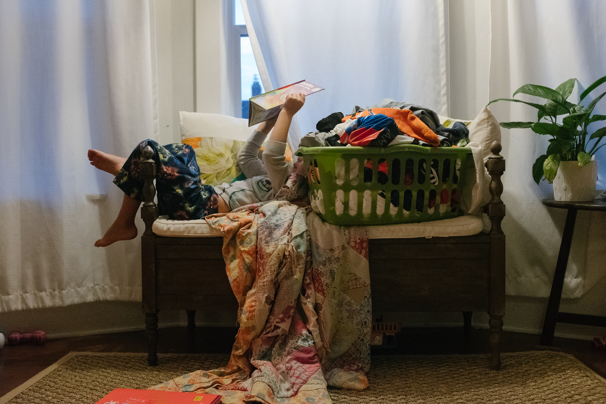 kids in laundry - Documentary Family Photography