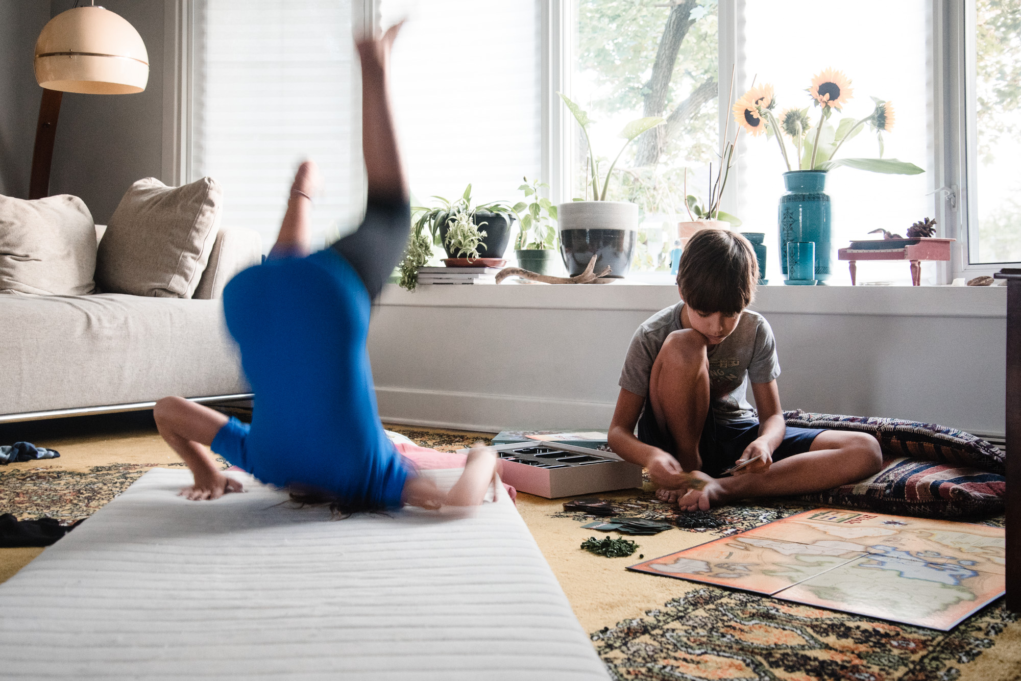 kids playing on floor in living room - Documentary Family Photography