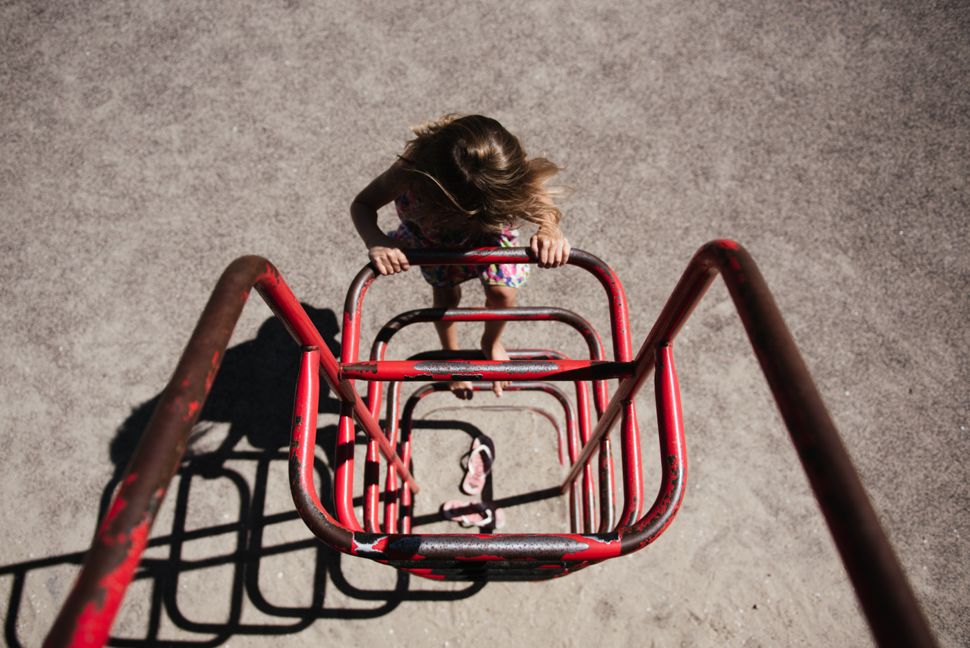 kid climbing playground - Documentary Family Photography