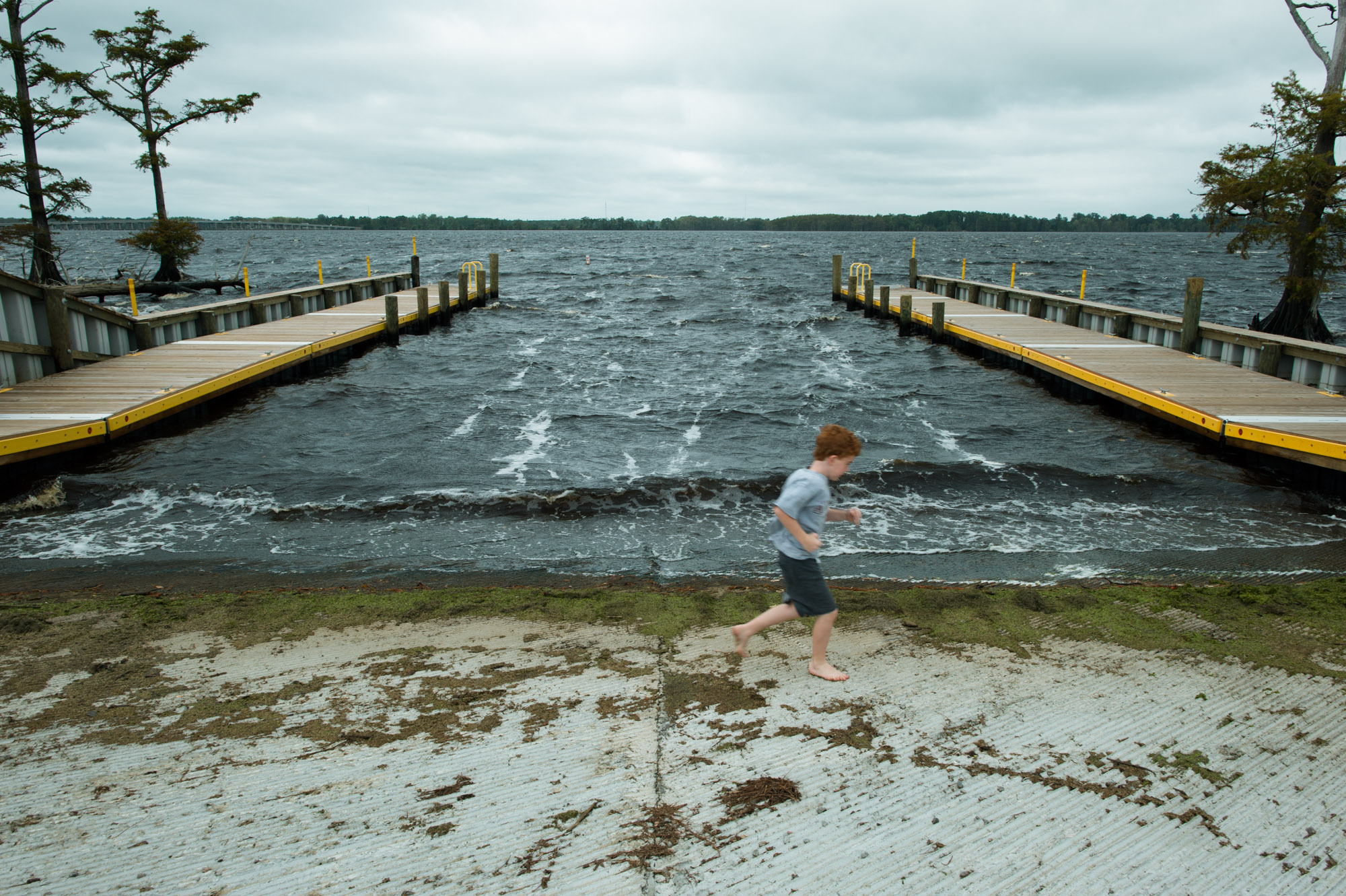 boy on shoreline - Documentary Family Photography